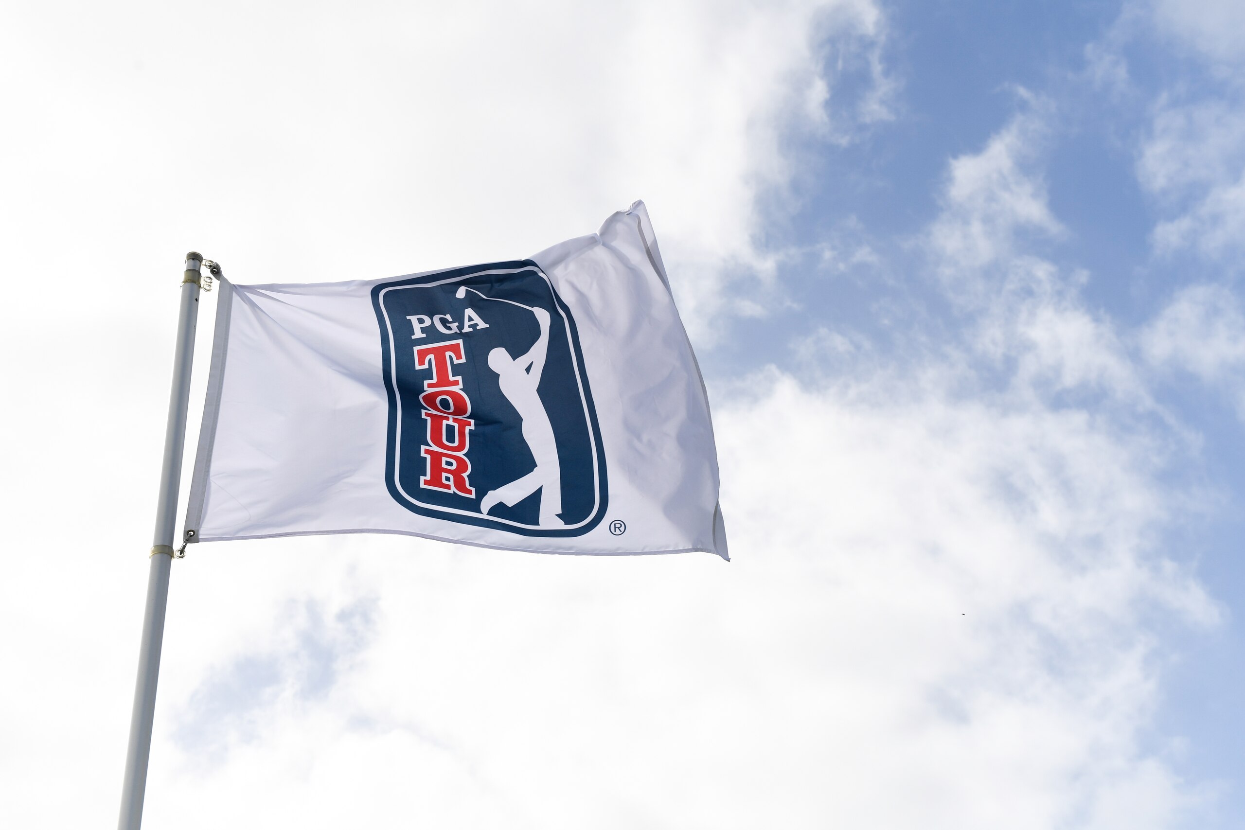 GREAT EXUMA, BAHAMAS - JANUARY 12: PGA TOUR flag during the first round of the Korn Ferry Tour's The Bahamas Great Exuma Classic at Sandals Emerald Bay golf course on January 12, 2020 in Great Exuma, Bahamas. (Photo by Ben Jared/PGA TOUR via Getty Images) GREAT EXUMA, BAHAMAS - JANUARY 12: PGA TOUR flag during the first round of the Korn Ferry Tour's The Bahamas Great Exuma Classic at Sandals Emerald Bay golf course on January 12, 2020 in Great Exuma, Bahamas. (Photo by Ben Jared/PGA TOUR via Getty Images)