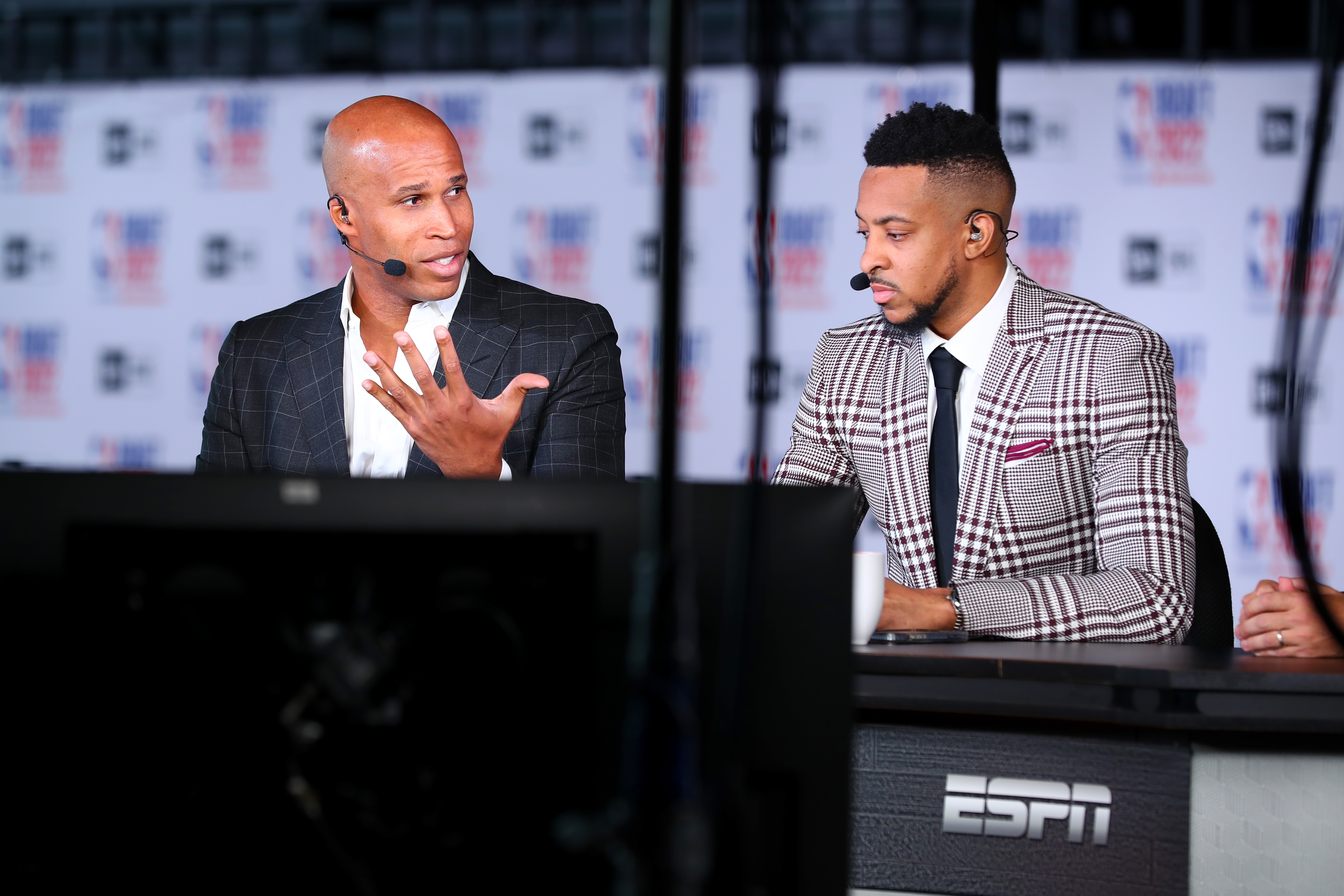 BROOKLYN, NY - JUNE 23: ESPN analyst, Richard Jefferson and CJ McCollum #3 of the New Orleans Pelicans report on the 2022 NBA Draft on June 23, 2022 at Barclays Center in Brooklyn, New York. NOTE TO USER: User expressly acknowledges and agrees that, by downloading and or using this photograph, User is consenting to the terms and conditions of the Getty Images License Agreement. Mandatory Copyright Notice: Copyright 2022 NBAE (Photo by David L. Nemec/NBAE via Getty Images)