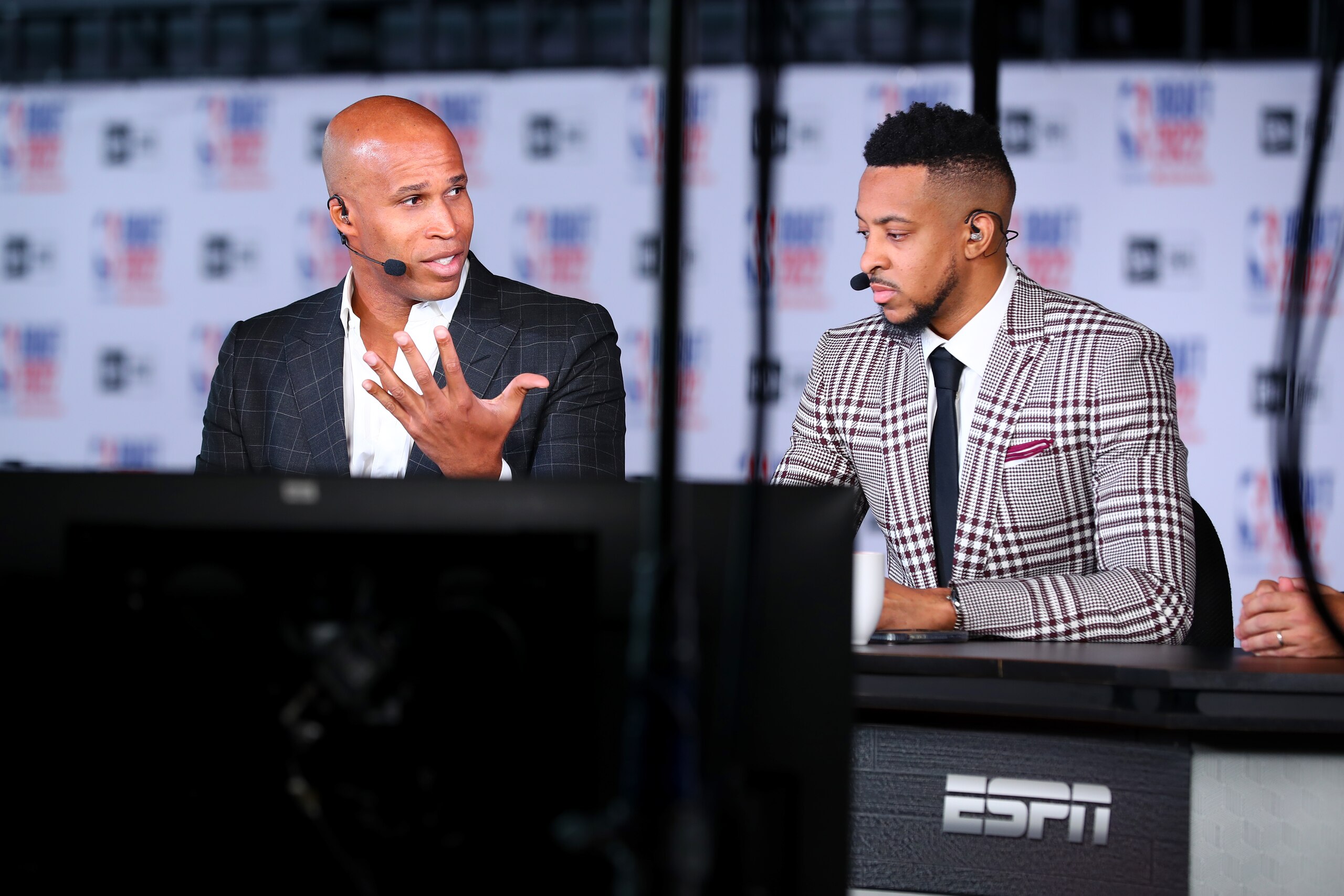 BROOKLYN, NY - JUNE 23: ESPN analyst, Richard Jefferson and CJ McCollum #3 of the New Orleans Pelicans report on the 2022 NBA Draft on June 23, 2022 at Barclays Center in Brooklyn, New York. NOTE TO USER: User expressly acknowledges and agrees that, by downloading and or using this photograph, User is consenting to the terms and conditions of the Getty Images License Agreement. Mandatory Copyright Notice: Copyright 2022 NBAE (Photo by David L. Nemec/NBAE via Getty Images)