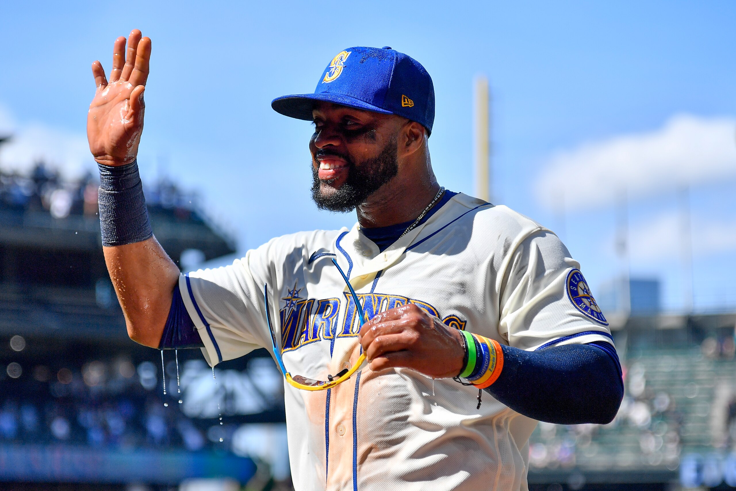 SEATTLE, WASHINGTON - JULY 10: Carlos Santana #41 of the Seattle Mariners waves after a post game Gatorade shower against the Toronto Blue Jays at T-Mobile Park on July 10, 2022 in Seattle, Washington. The Seattle Mariners won 6-5. (Photo by Alika Jenner/Getty Images) SEATTLE, WASHINGTON - JULY 10: Carlos Santana #41 of the Seattle Mariners waves after a post game Gatorade shower against the Toronto Blue Jays at T-Mobile Park on July 10, 2022 in Seattle, Washington. The Seattle Mariners won 6-5. (Photo by Alika Jenner/Getty Images)
