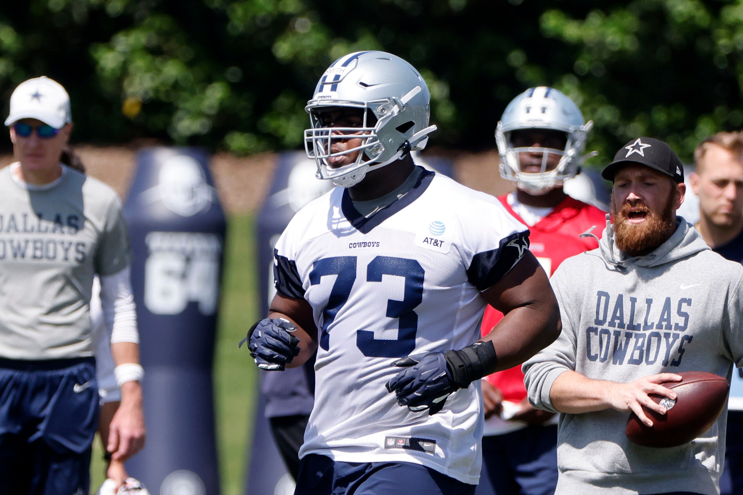 Dallas Cowboys offensive lineman Tyler Smith (73) jogs to the next drill during the NFL football team's rookie minicamp in Frisco, Texas, Friday, May 13, 2022. (AP Photo/Michael Ainsworth)