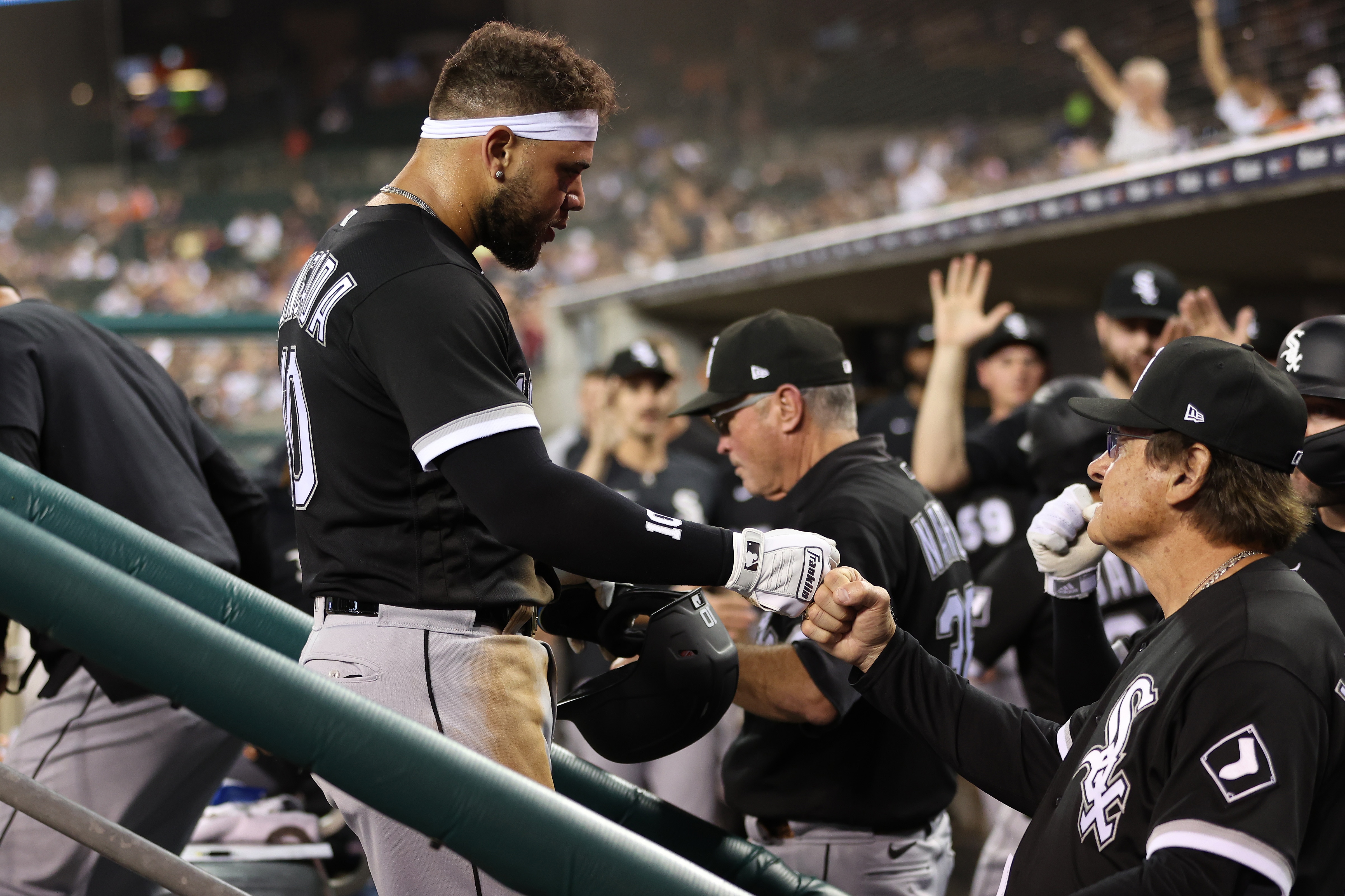 DETROIT, MICHIGAN - JUNE 13: Yoan Moncada #10 of the Chicago White Sox celebrates scoring a run in the sixth inning with manager Tony La Russa while playing the Detroit Tigers at Comerica Park on June 13, 2022 in Detroit, Michigan. (Photo by Gregory Shamus/Getty Images)
