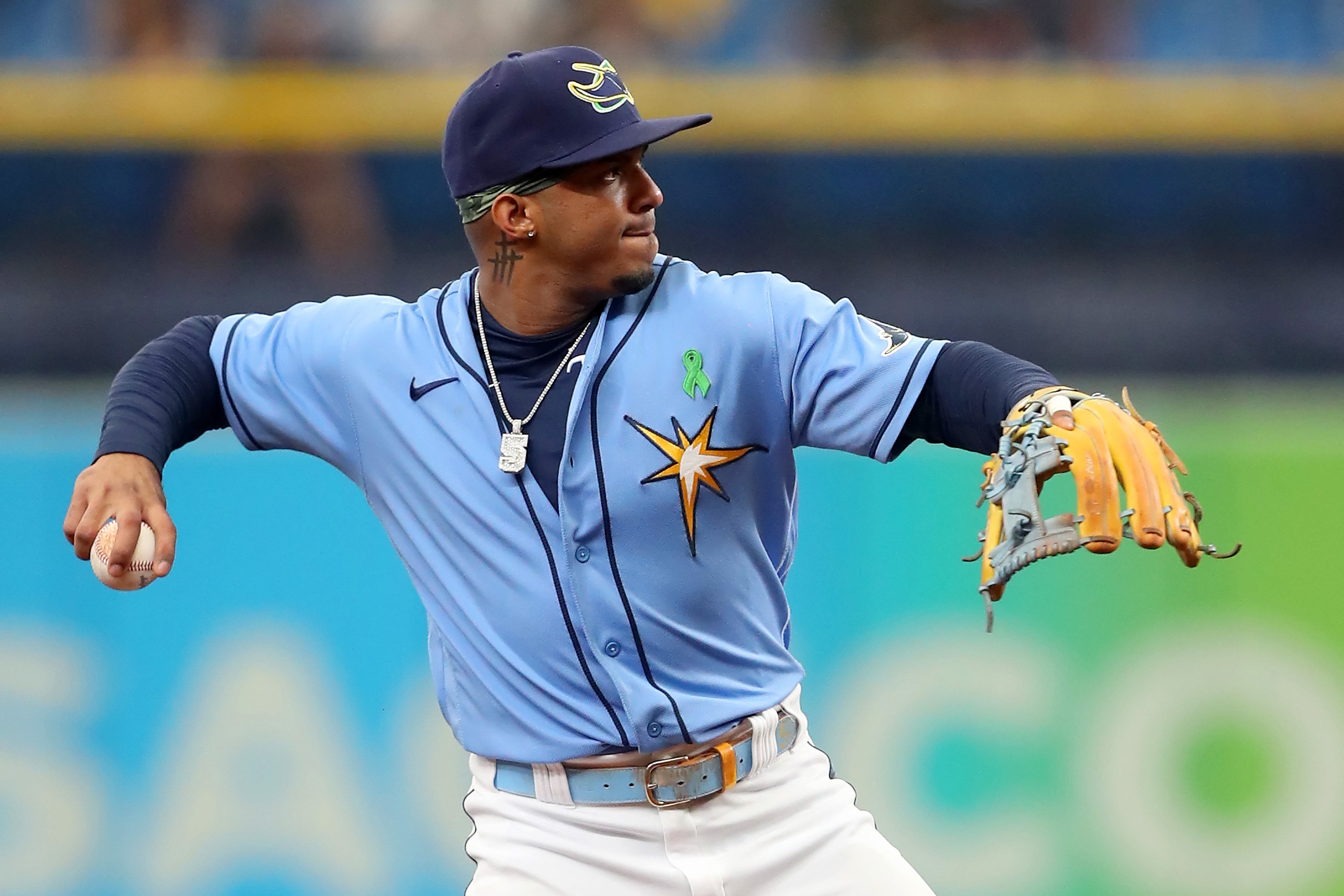 ST. PETERSBURG, FL - MAY 29: Tampa Bay Rays infielder Wander Franco (5) throws the ball across the infield during the MLB regular season game between the New York Yankees and the Tampa Bay Rays on May 29, 2022, at Tropicana Field in St. Petersburg, FL. (Photo by Cliff Welch/Icon Sportswire via Getty Images) ST. PETERSBURG, FL - MAY 29: Tampa Bay Rays infielder Wander Franco (5) throws the ball across the infield during the MLB regular season game between the New York Yankees and the Tampa Bay Rays on May 29, 2022, at Tropicana Field in St. Petersburg, FL. (Photo by Cliff Welch/Icon Sportswire via Getty Images)