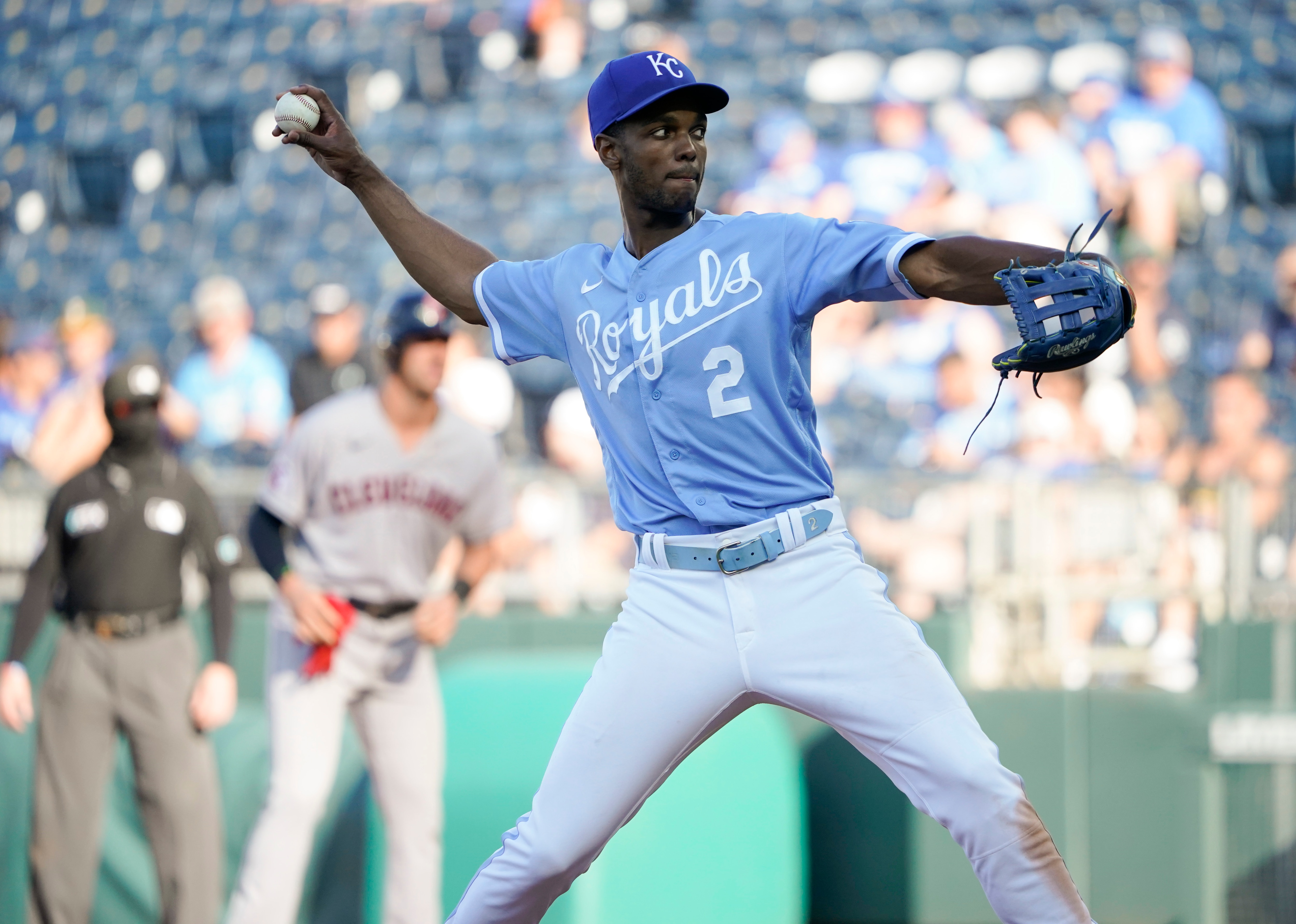 KANSAS CITY, MISSOURI - JULY 09: Michael A. Taylor #2 of the Kansas City Royals throws in the ninth inning against the Cleveland Guardians at Kauffman Stadium on July 09, 2022 in Kansas City, Missouri. (Photo by Ed Zurga/Getty Images)