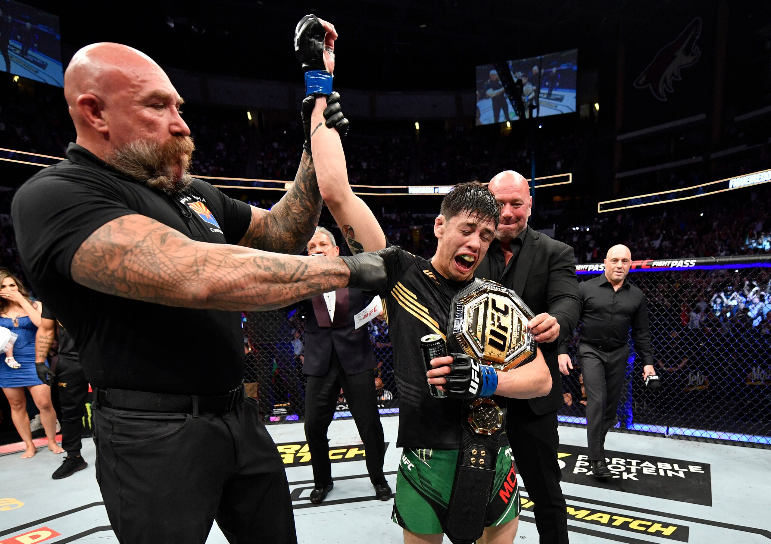 GLENDALE, ARIZONA - JUNE 12: Brandon Moreno of Mexico reacts after submitting Deiveson Figueiredo of Brazil to win the UFC flyweight championship fight during the UFC 263 event at Gila River Arena on June 12, 2021 in Glendale, Arizona. (Photo by Jeff Bottari/Zuffa LLC) GLENDALE, ARIZONA - JUNE 12: Brandon Moreno of Mexico reacts after submitting Deiveson Figueiredo of Brazil to win the UFC flyweight championship fight during the UFC 263 event at Gila River Arena on June 12, 2021 in Glendale, Arizona. (Photo by Jeff Bottari/Zuffa LLC)
