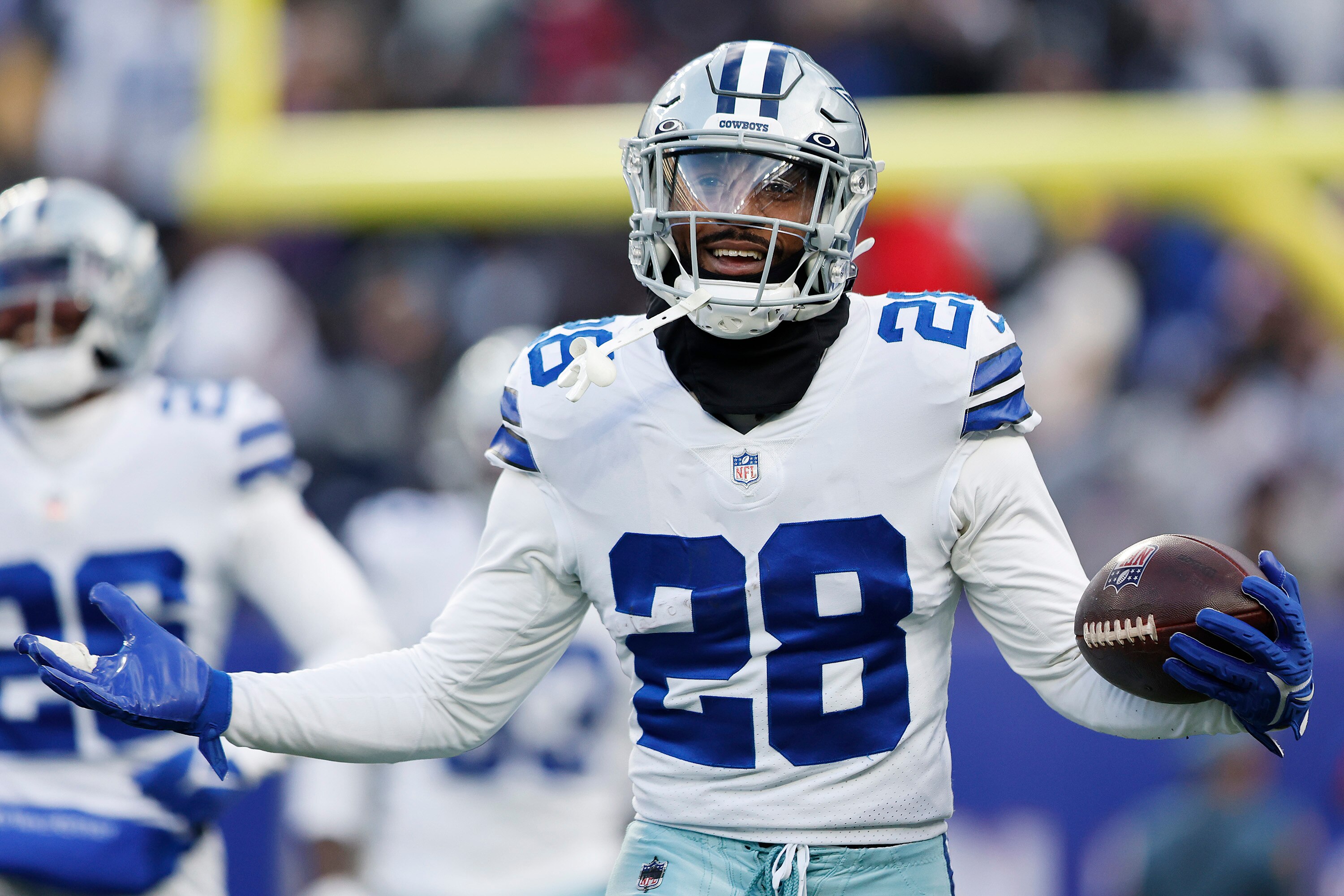 EAST RUTHERFORD, NEW JERSEY - DECEMBER 19: Malik Hooker #28 of the Dallas Cowboys reacts after making an interception during the fourth quarter against the New York Giants at MetLife Stadium on December 19, 2021 in East Rutherford, New Jersey. (Photo by Rey Del Rio/Getty Images)