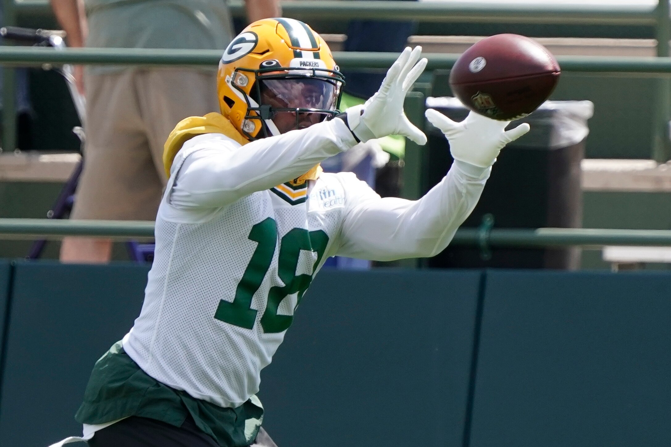 Green Bay Packers' Randall Cobb runs a drill at the NFL football team's practice field Tuesday, June 7, 2022, in Green Bay, Wis. (AP Photo/Morry Gash)