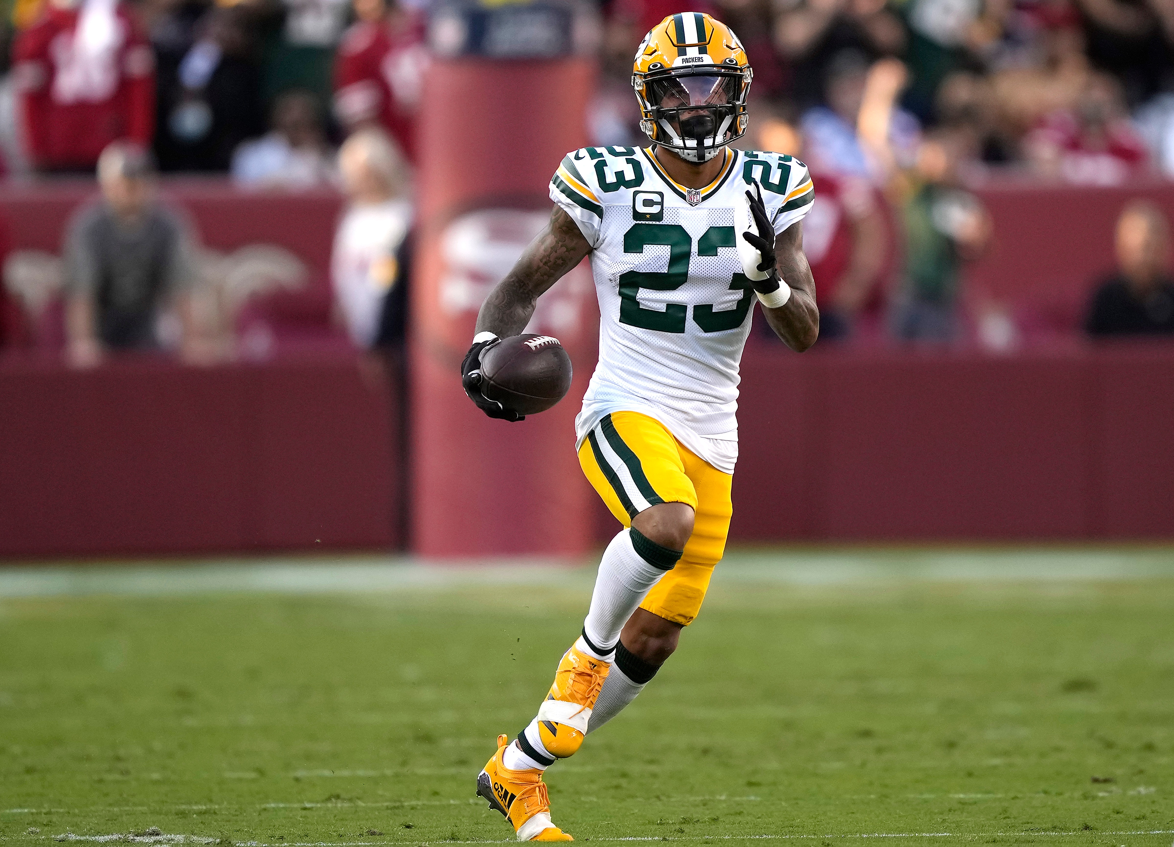 SANTA CLARA, CALIFORNIA - SEPTEMBER 26: Jaire Alexander #23 of the Green Bay Packers runs after intercepting a pass during the first half against the San Francisco 49ers in the game at Levi's Stadium on September 26, 2021 in Santa Clara, California. (Photo by Thearon W. Henderson/Getty Images)