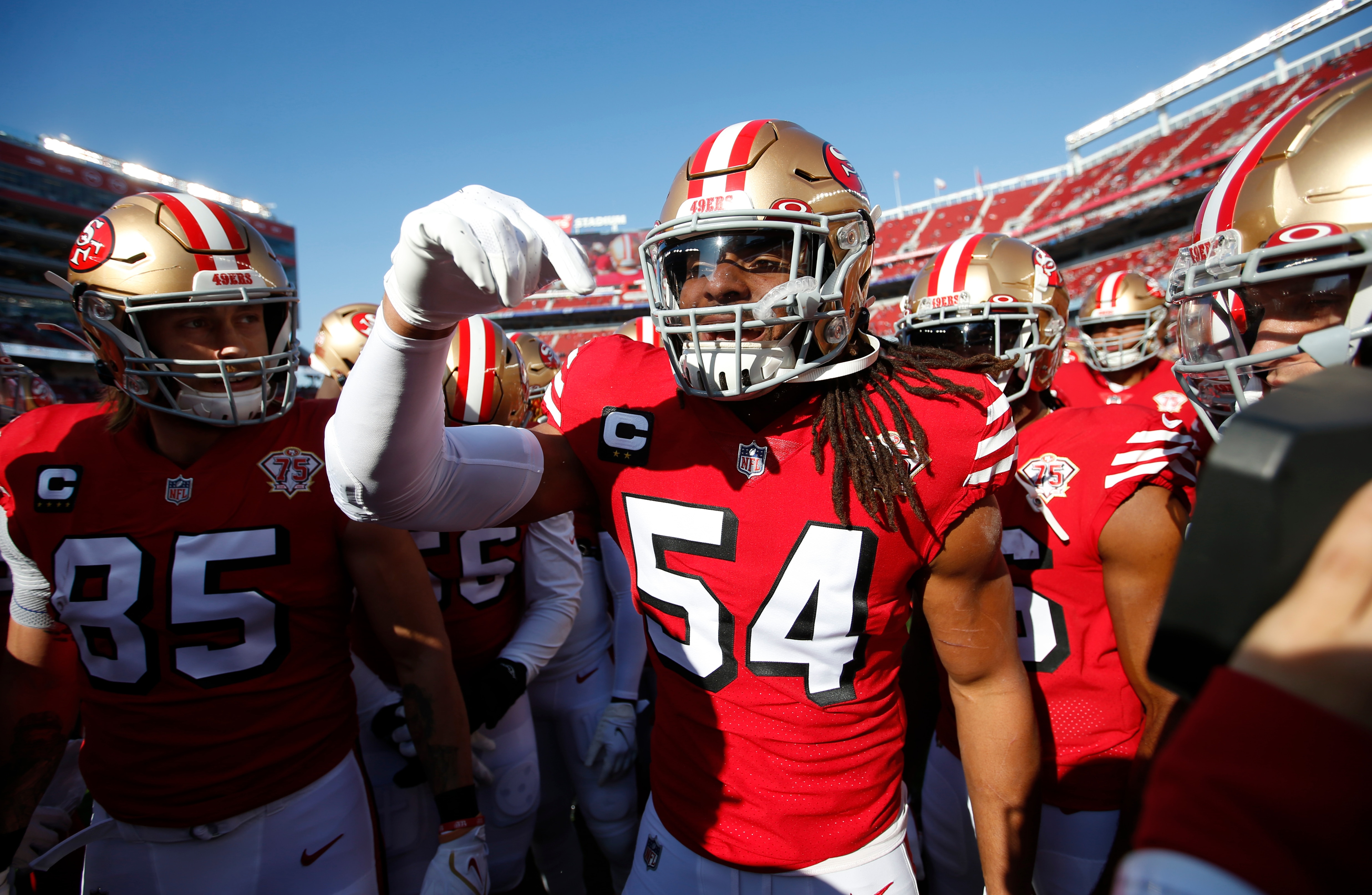 SANTA CLARA, CA - DECEMBER 19: Fred Warner #54 of the San Francisco 49ers fires up the team on the field before the game against the Atlanta Falcons at Levi's Stadium on December 19, 2021 in Santa Clara, California. The 49ers defeated the Falcons 31-13. (Photo by Michael Zagaris/San Francisco 49ers/Getty Images)
