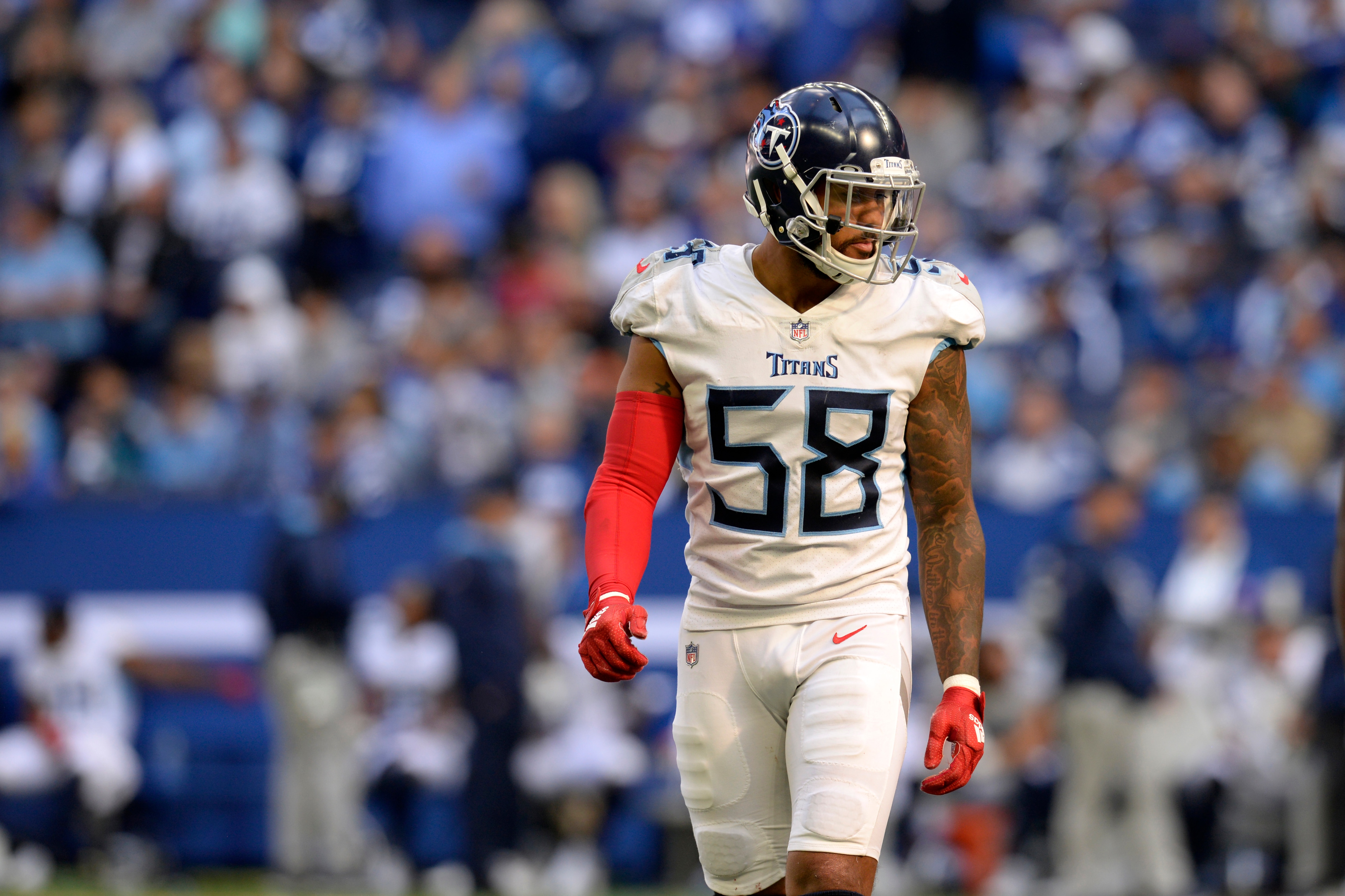 INDIANAPOLIS, IN - OCTOBER 31: Tennessee Titans Linebacker Harold Landry (58) looks across the field during the NFL football game between the Tennessee Titans and the Indianapolis Colts on October 31, 2021, at Lucas Oil Stadium in Indianapolis, Indiana. (Photo by Michael Allio/Icon Sportswire via Getty Images)