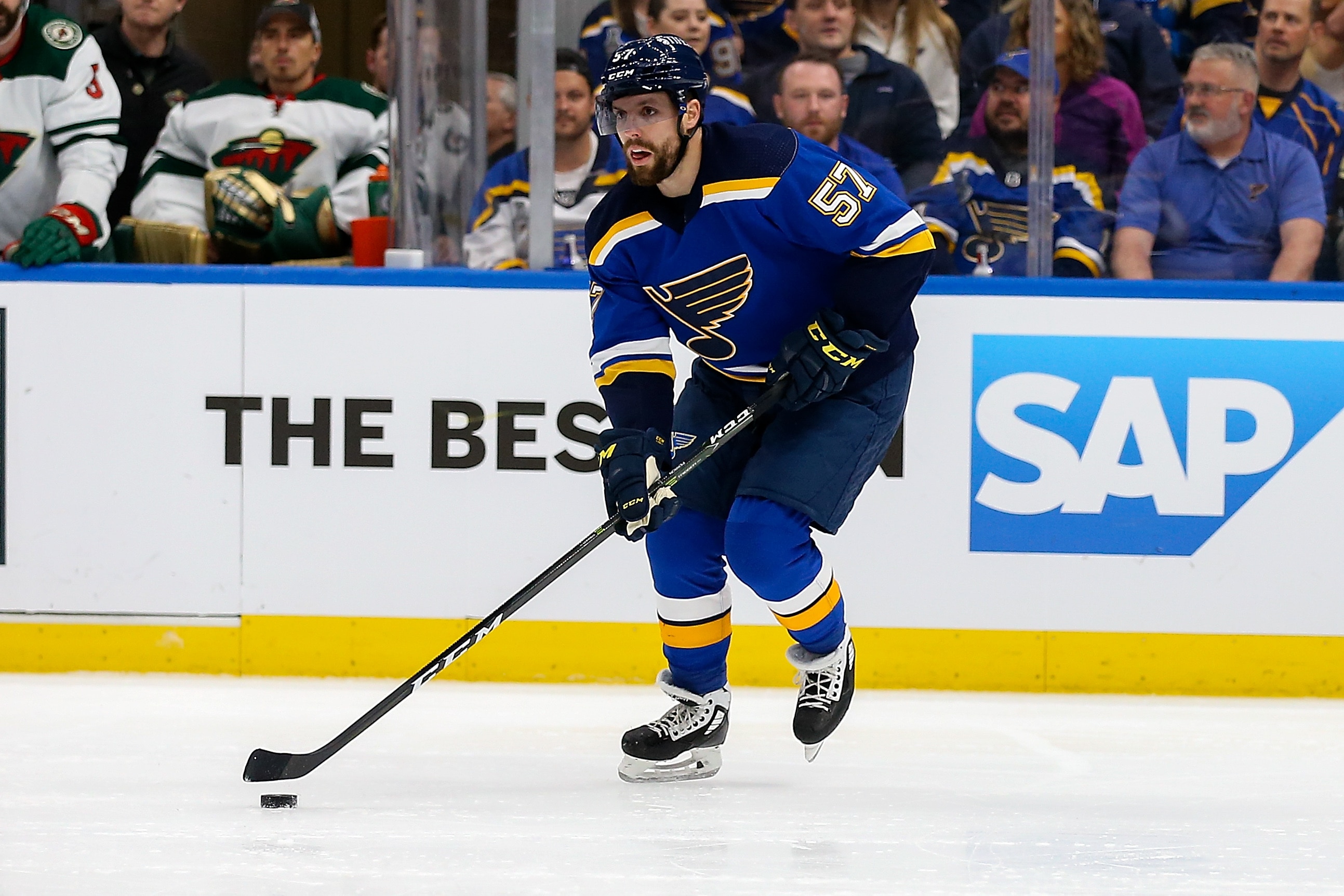 ST LOUIS, MO - MAY 12: David Perron #57 of the St. Louis Blues controls the puck during the first period against the Minnesota Wild in Game Six of the First Round of the 2022 Stanley Cup Playoff at the Enterprise Center on May 12, 2022 in St Louis, Missouri. (Photo by Scott Kane/Getty Images)