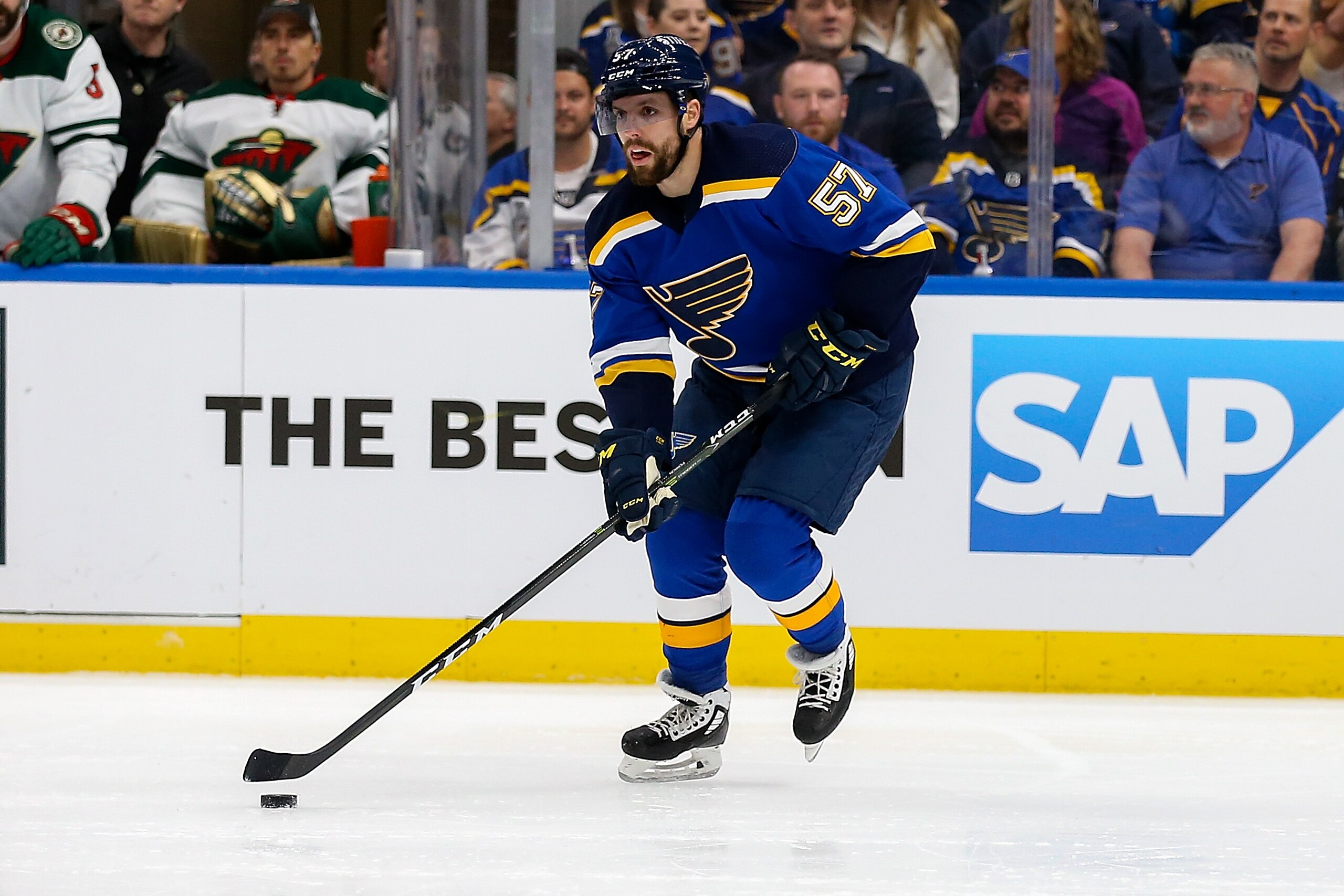 ST LOUIS, MO - MAY 12: David Perron #57 of the St. Louis Blues controls the puck during the first period against the Minnesota Wild in Game Six of the First Round of the 2022 Stanley Cup Playoff at the Enterprise Center on May 12, 2022 in St Louis, Missouri. (Photo by Scott Kane/Getty Images)