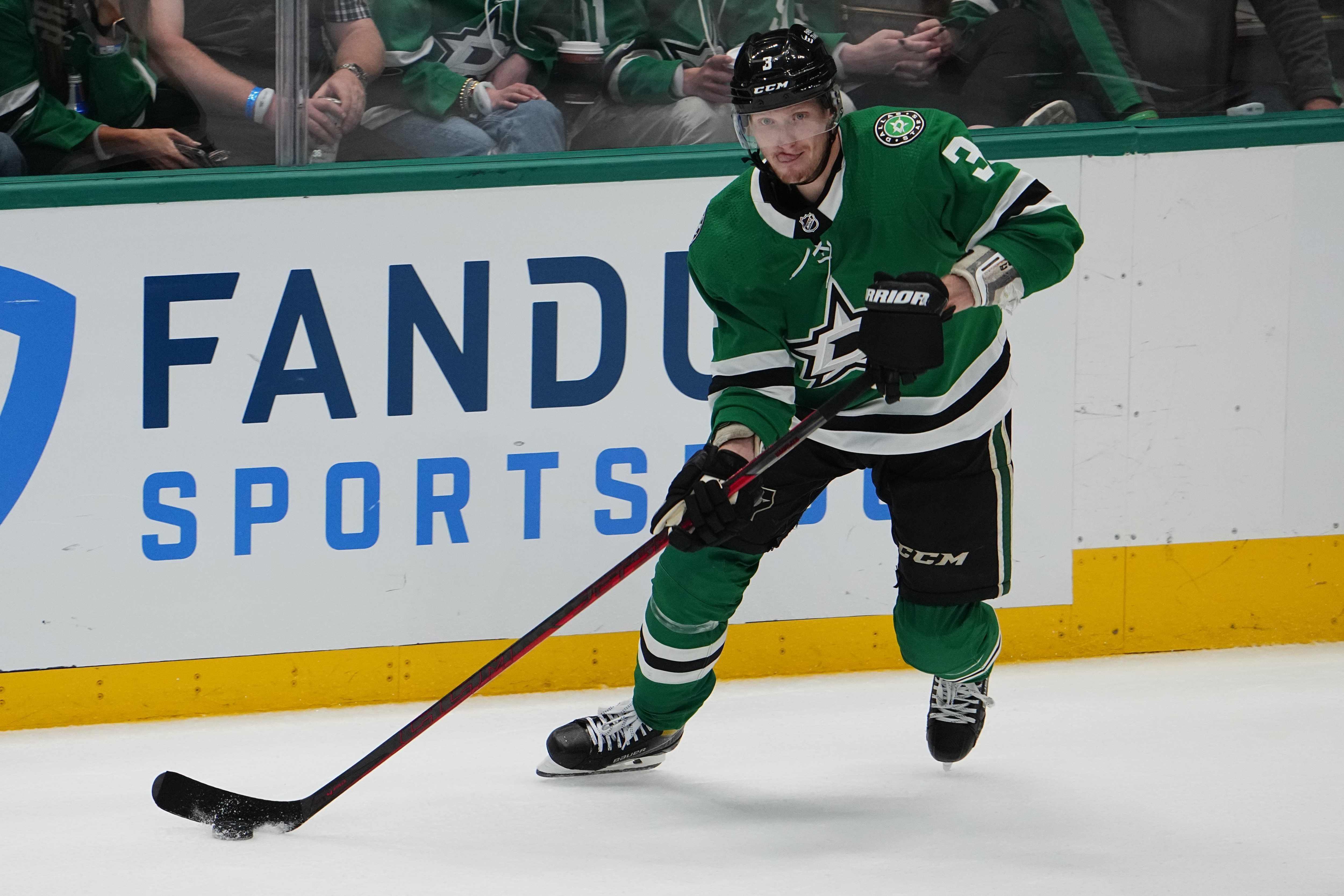 DALLAS, TX - MAY 13: John Klingberg #3 of the Dallas Stars handles the puck against the Calgary Flames in Game Six of the First Round of the 2022 Stanley Cup Playoffs at the American Airlines Center on May 13, 2022 in Dallas, Texas. (Photo by Glenn James/NHLI via Getty Images)