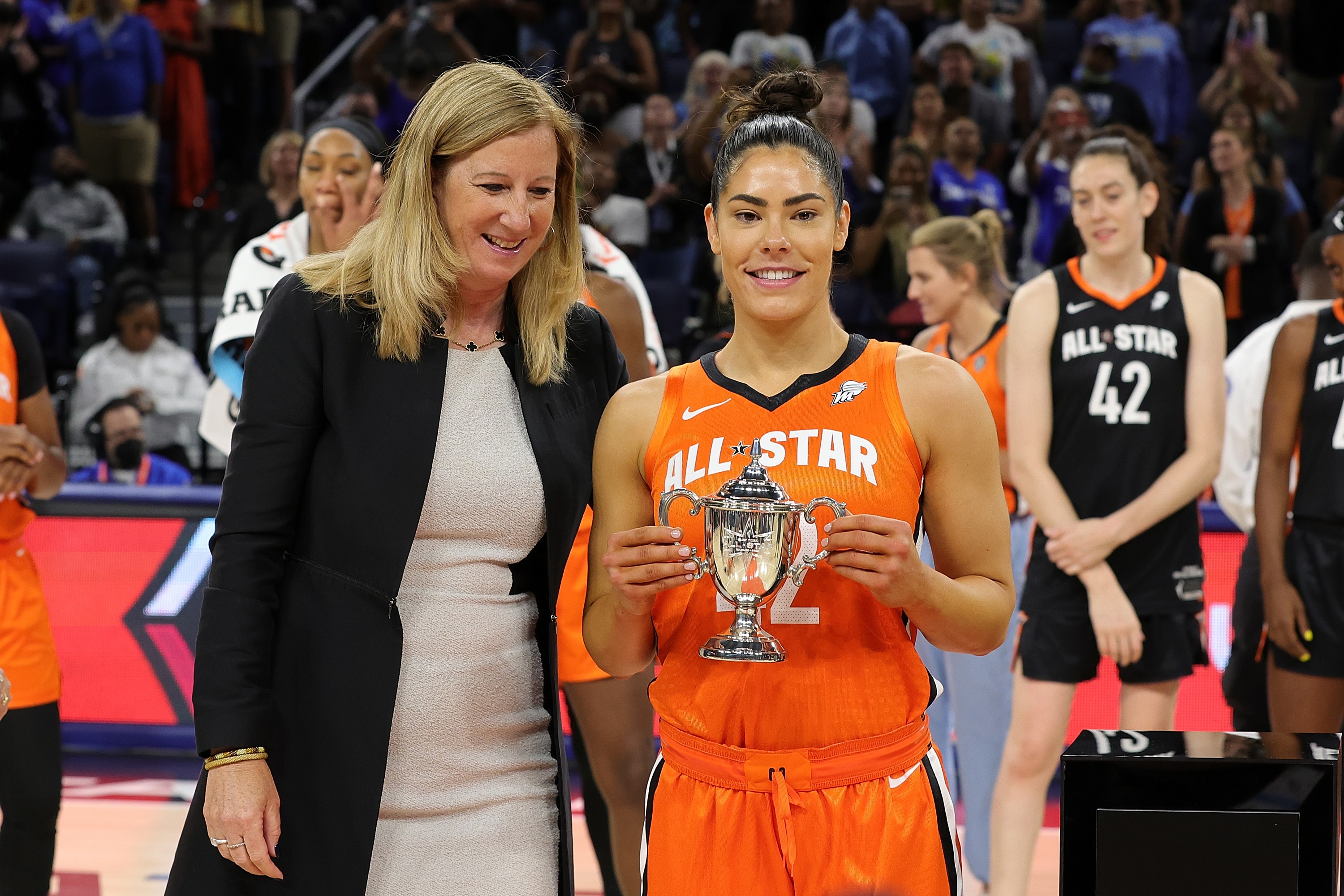 CHICAGO, ILLINOIS - JULY 10: Kelsey Plum #10 of Team Wilson is presented with the MVP trophy during the 2022 AT&T WNBA All-Star Game at the Wintrust Arena on July 10, 2022 in Chicago, Illinois. (Photo by Stacy Revere/Getty Images)