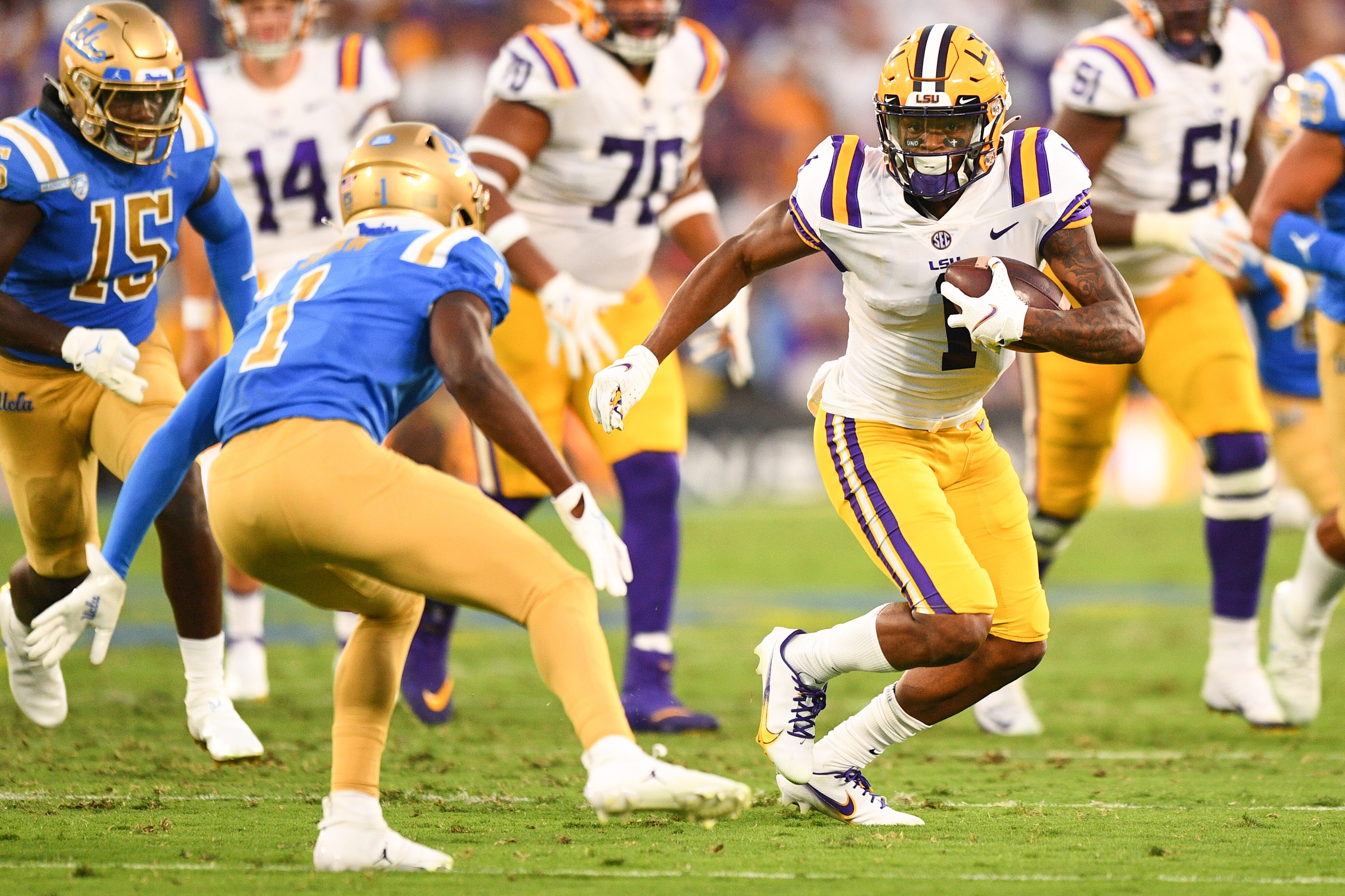 PASADENA, CA - SEPTEMBER 04: LSU Tigers Wide Receiver Kayshon Boutte (1) tries to escape a defender during a college football game between the LSU Tigers and the UCLA Bruins played on September 4, 2021 at the Rose Bowl in Pasadena, CA. (Photo by Brian Rothmuller/Icon Sportswire via Getty Images)