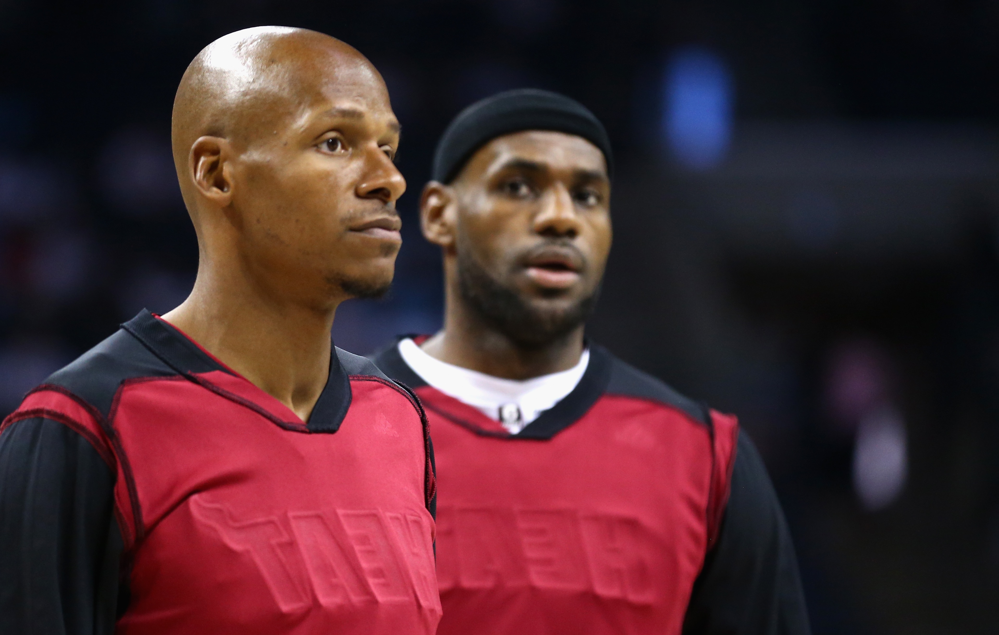 CHARLOTTE, NC - APRIL 28:  Ray Allen #34 of the Miami Heat and teammate LeBron James #6 wear a black head band and inside out warm up jersey before their game against the Charlotte Bobcats in Game Four of the Eastern Conference Quarterfinals during the 2014 NBA Playoffs at Time Warner Cable Arena on April 28, 2014 in Charlotte, North Carolina.  NOTE TO USER: User expressly acknowledges and agrees that, by downloading and or using this photograph, User is consenting to the terms and conditions of the Getty Images License Agreement.  (Photo by Streeter Lecka/Getty Images) 