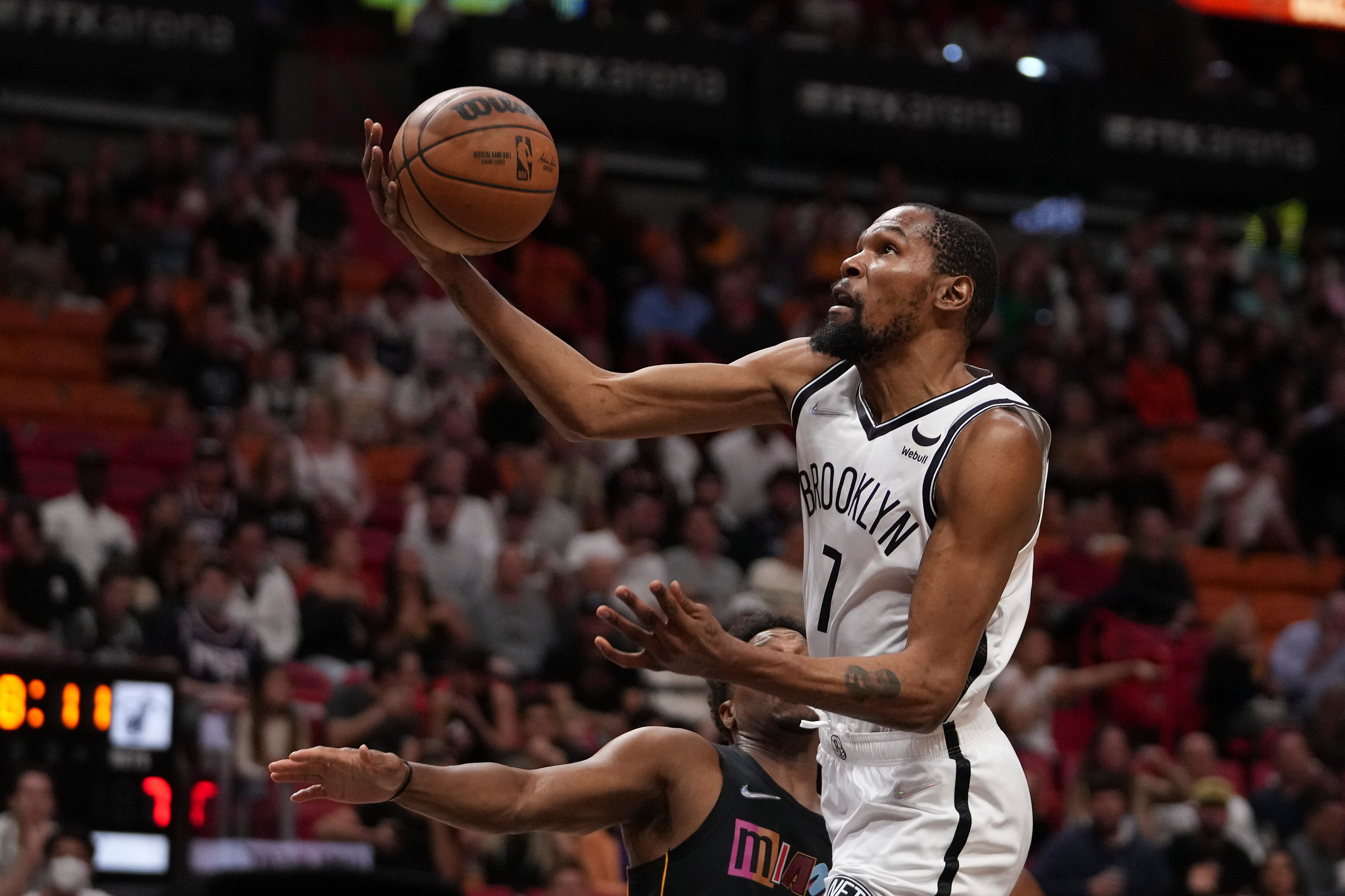 MIAMI, FLORIDA - MARCH 26: Kevin Durant #7 of the Brooklyn Nets attempts a layup during the first half against the Miami Heat at FTX Arena on March 26, 2022 in Miami, Florida. NOTE TO USER: User expressly acknowledges and agrees that,  by downloading and or using this photograph,  User is consenting to the terms and conditions of the Getty Images License Agreement. (Photo by Eric Espada/Getty Images) (Photo by Eric Espada/Getty Images)