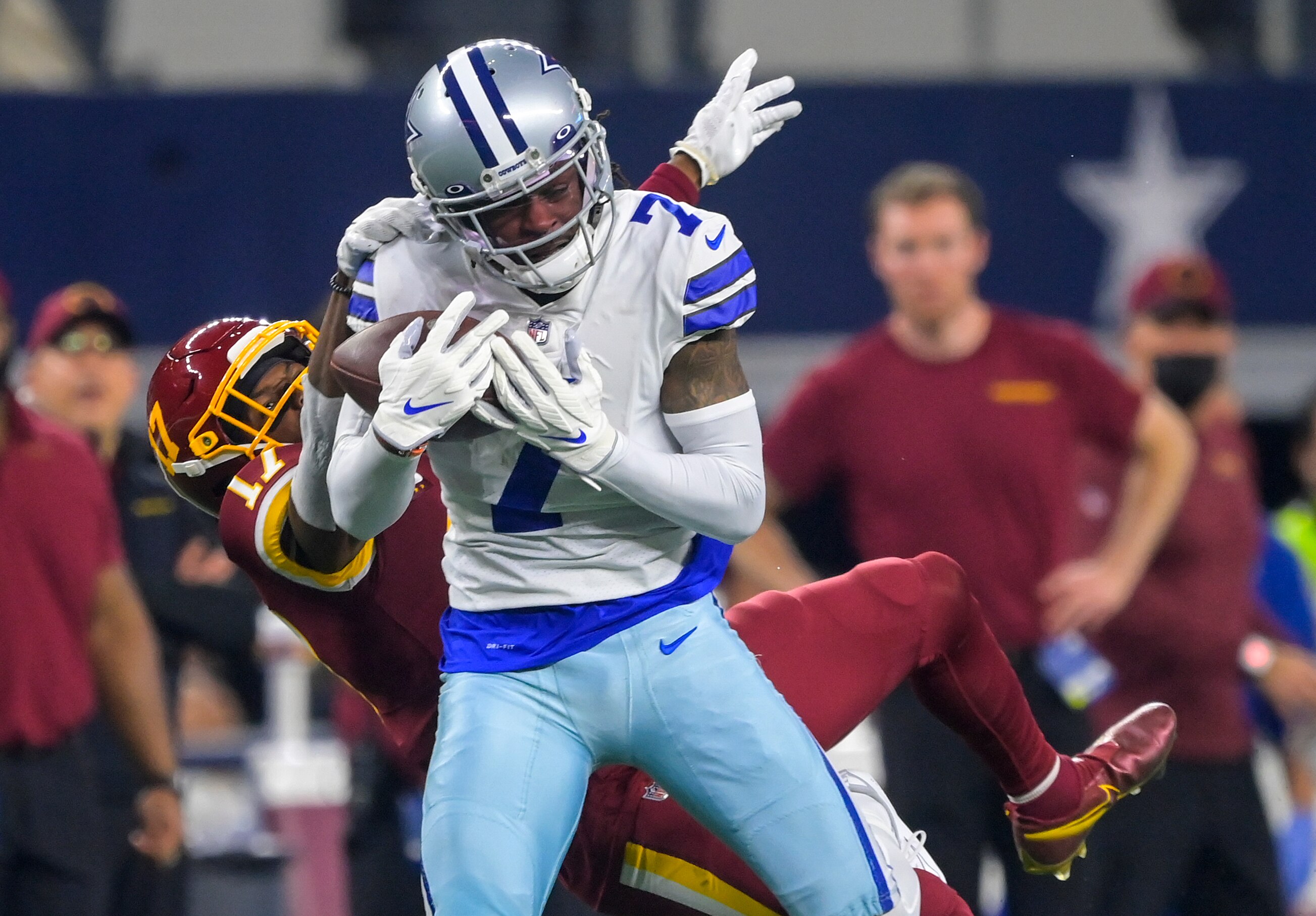 ARLINGTON, TX - DECEMBER 26: Dallas Cowboys cornerback Trevon Diggs intercepts a pass intended for Washington Football Team wide receiver Terry McLaurin (17) in the first quarter during a game between the Dallas Cowboys and the Washington Football Team  at At&T Stadium on December 26, 2021 in Arlington, TX. (Photo by John McDonnell/The Washington Post via Getty Images)