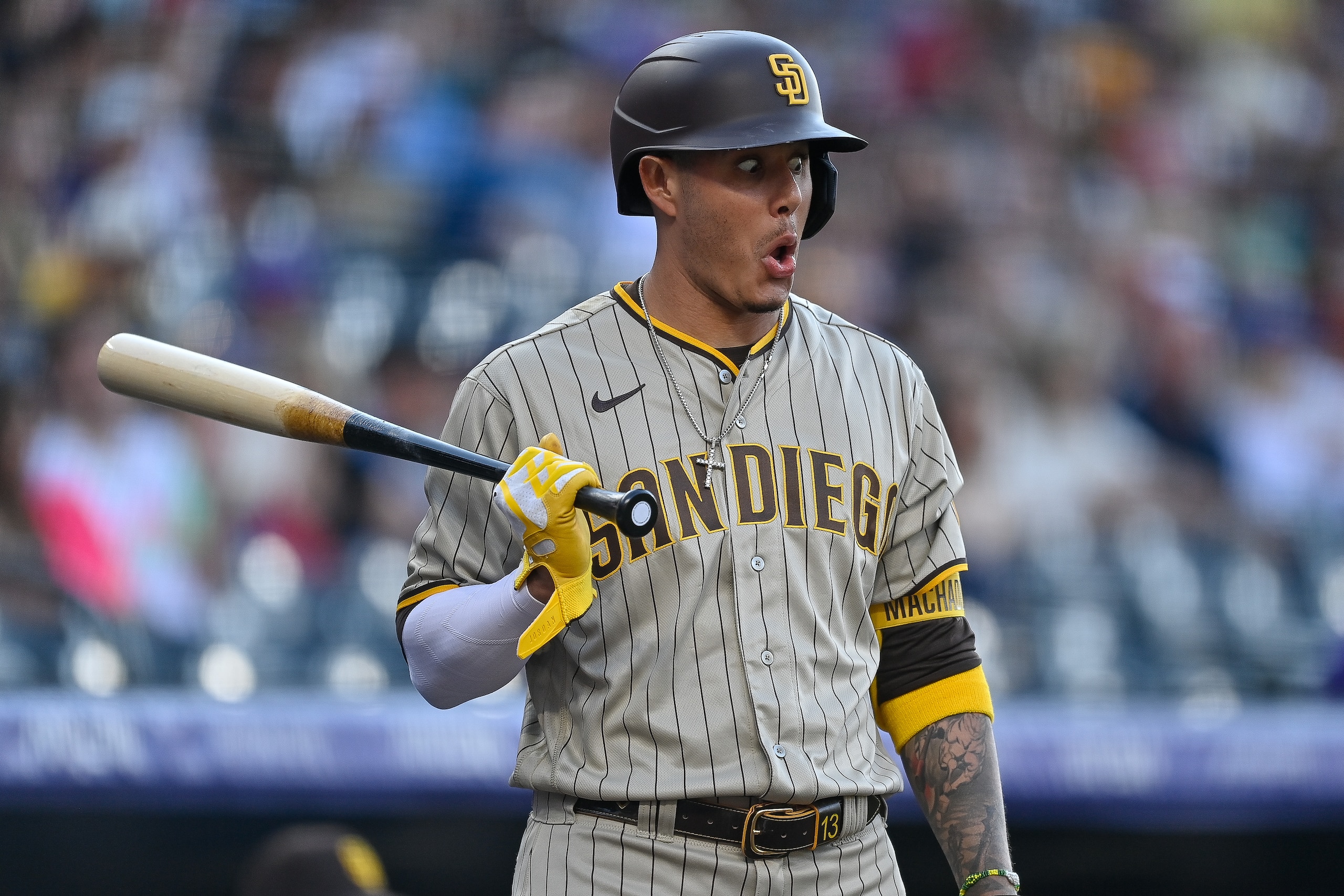 DENVER, CO - JULY 11: San Diego Padres third baseman Manny Machado (13) prepares to bat during a game between the San Diego Padres and the Colorado Rockies at Coors Field on July 11, 2022 in Denver, Colorado. (Photo by Dustin Bradford/Icon Sportswire via Getty Images)