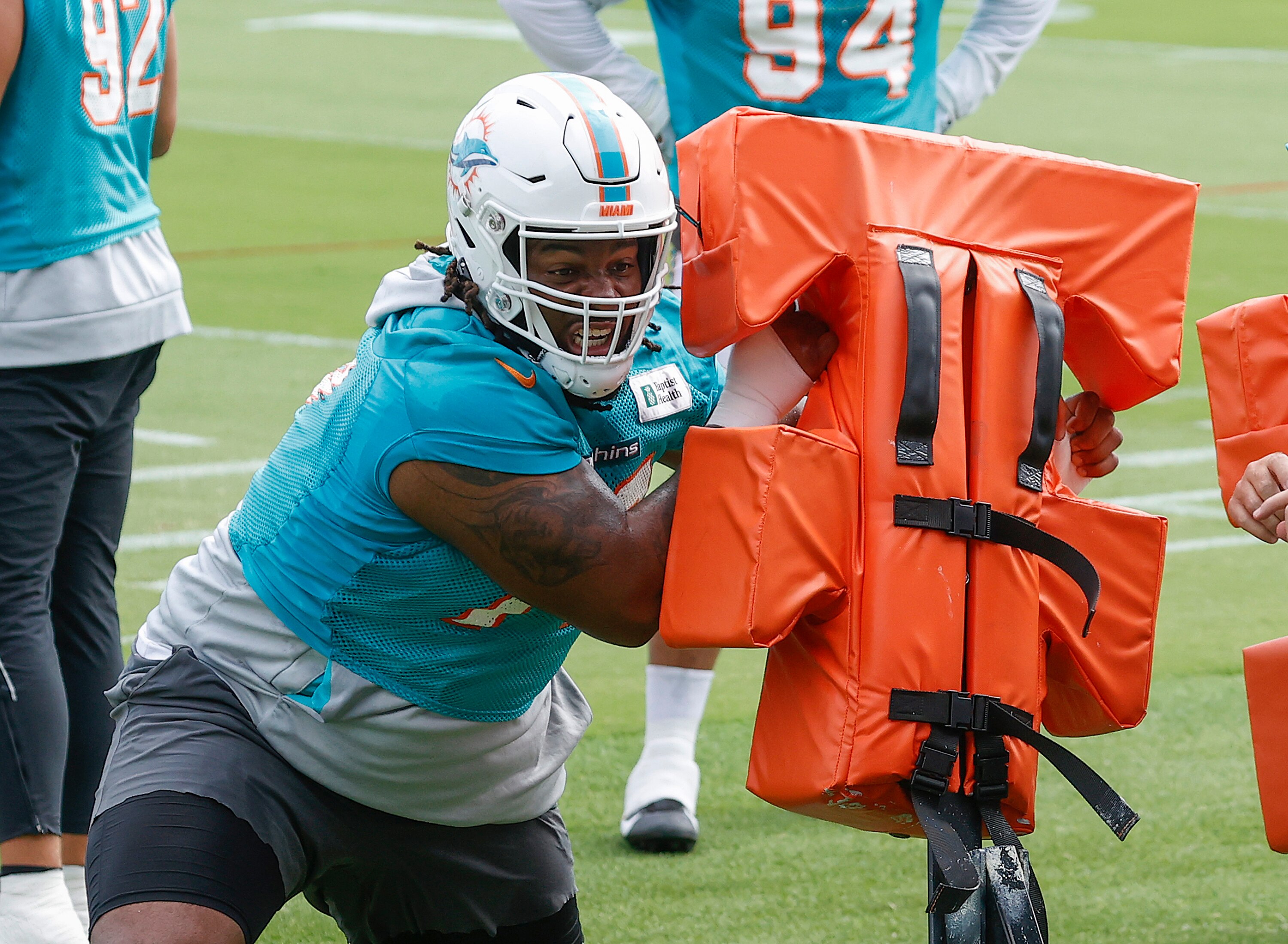 MIAMI GARDENS, FL - JUNE 2: John Jenkins #77 of the Miami Dolphins runs a drill during the Miami Dolphins Mandatory Minicamp at the Baptist Health Training Complex on June 2, 2022 in Miami Gardens, Florida. (Photo by Joel Auerbach/Getty Images)
