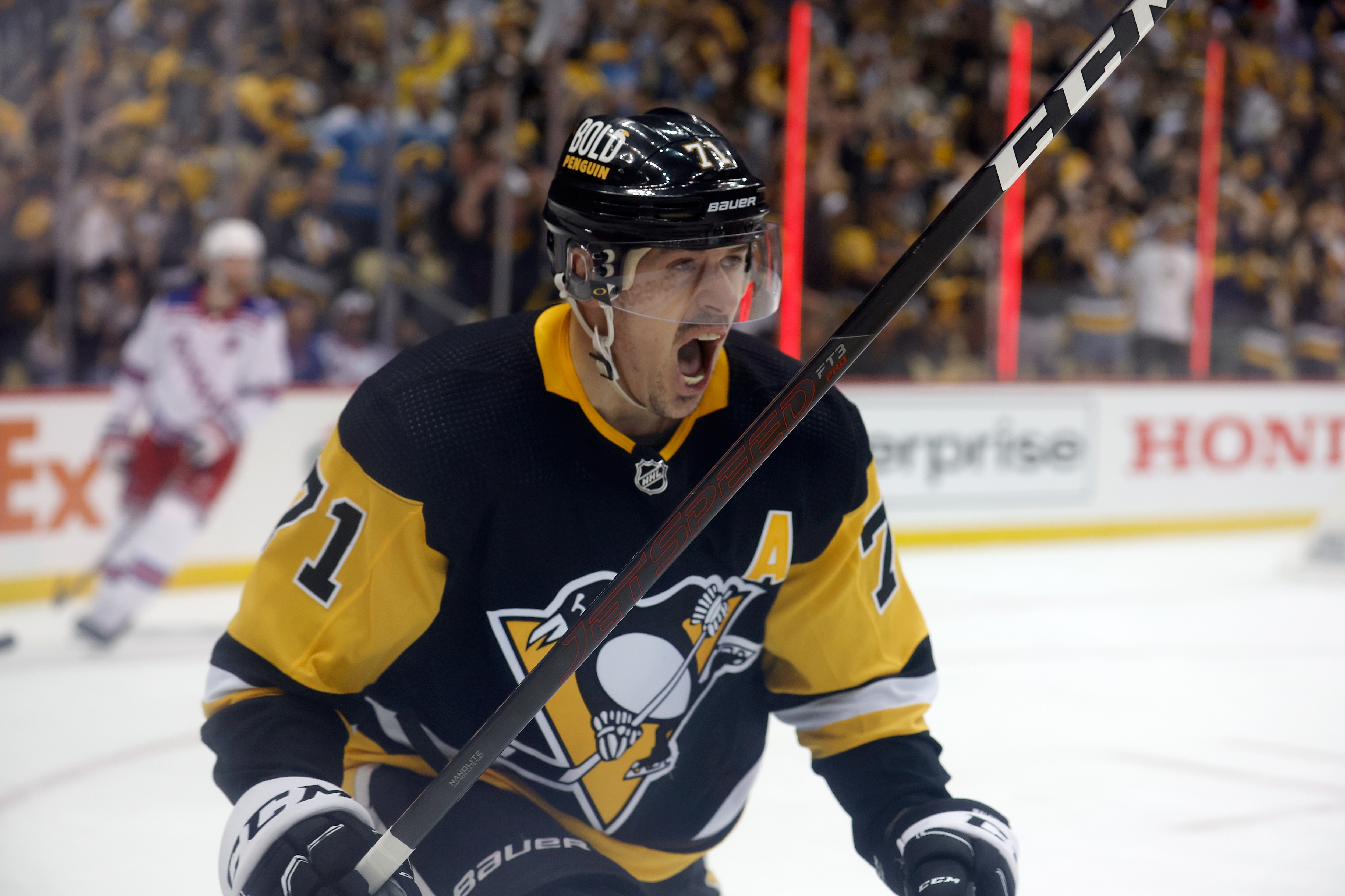 PITTSBURGH, PA - MAY 13:  Evgeni Malkin #71 of the Pittsburgh Penguins reacts after scoring a goal during the second period in Game Six of the First Round of the 2022 Stanley Cup Playoffs against the New York Rangers at PPG PAINTS Arena on May 13, 2022 in Pittsburgh, Pennsylvania. (Photo by Kirk Irwin/Getty Images)