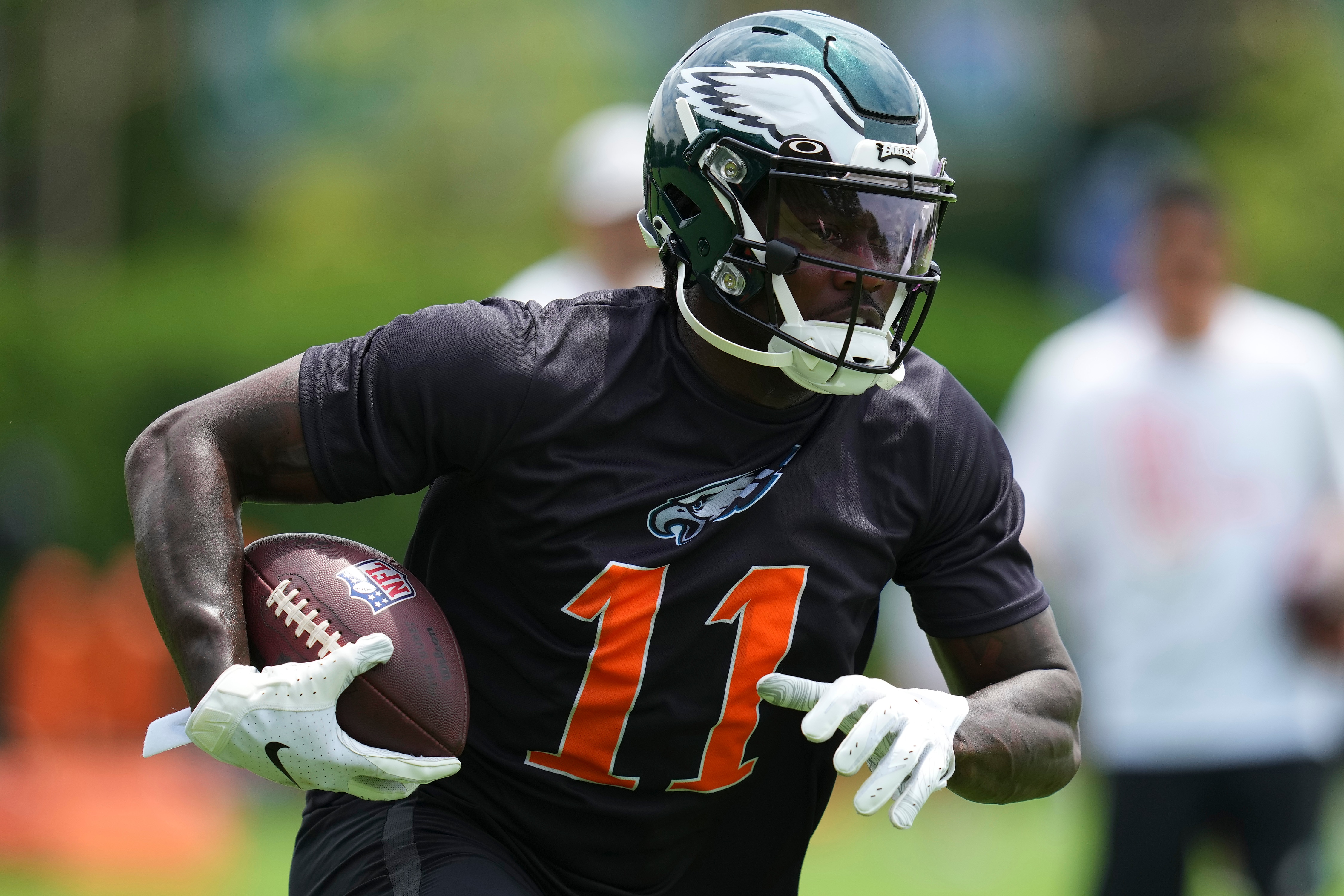 PHILADELPHIA, PA - JUNE 03: A.J. Brown #11 of the Philadelphia Eagles runs with the ball during OTAs at the NovaCare Complex on June 3, 2022 in Philadelphia, Pennsylvania. (Photo by Mitchell Leff/Getty Images)