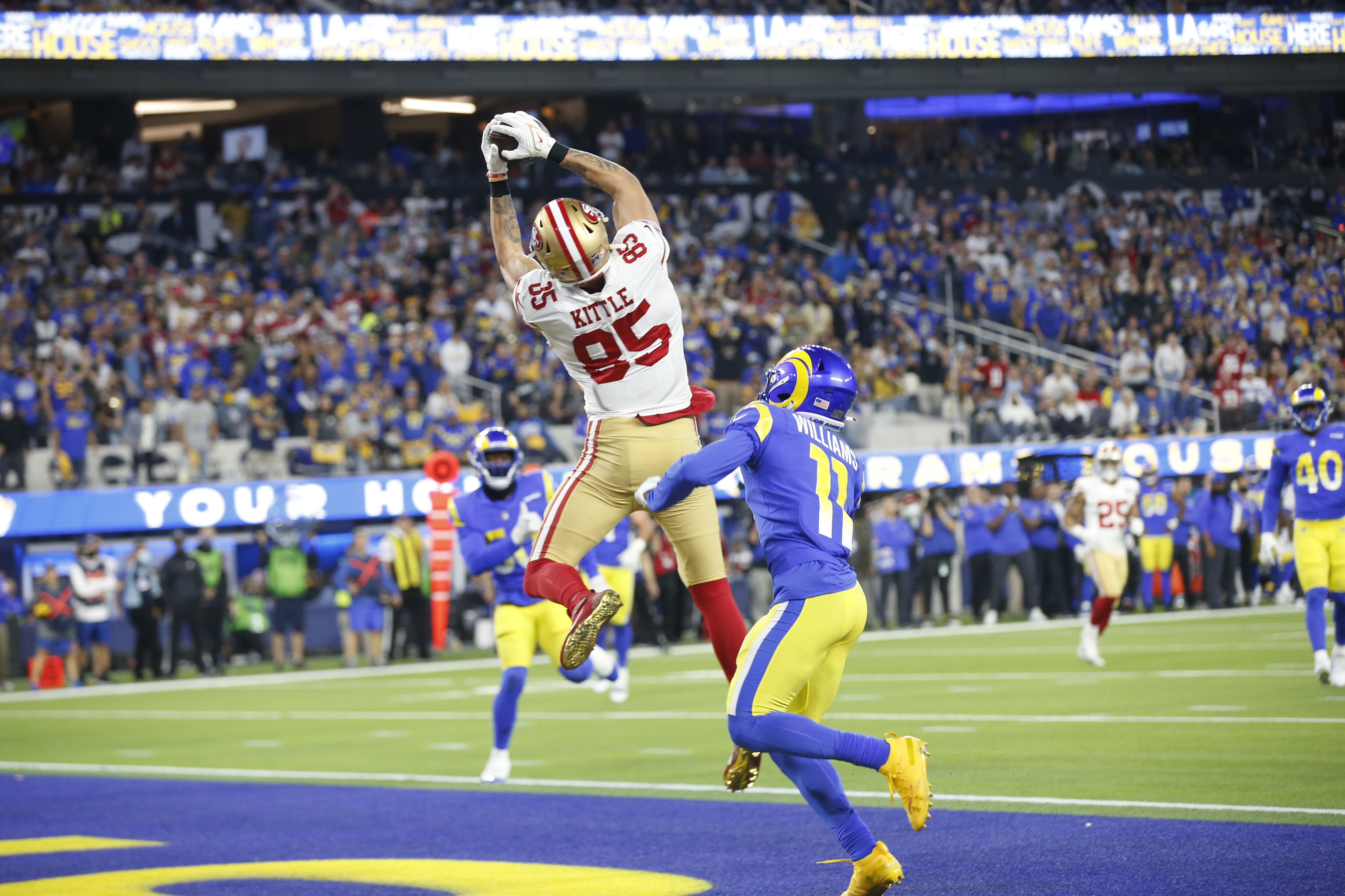 INGLEWOOD, CA - JANUARY 30: George Kittle #85 of the San Francisco 49ers makes a 16-yard touchdown catch  during the game against the Los Angeles Rams at SoFi Stadium on January 30, 2022 in Inglewood, California. The Rams defeated the 49ers 20-17. (Photo by Michael Zagaris/San Francisco 49ers/Getty Images)