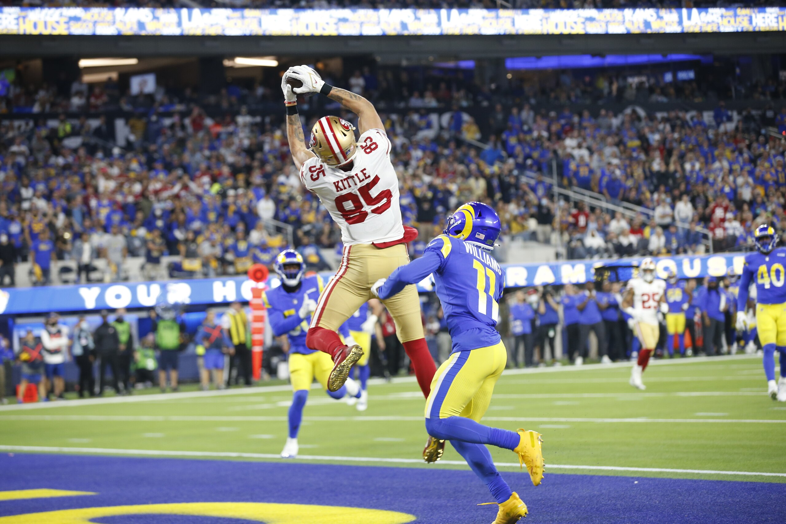 INGLEWOOD, CA - JANUARY 30: George Kittle #85 of the San Francisco 49ers makes a 16-yard touchdown catch  during the game against the Los Angeles Rams at SoFi Stadium on January 30, 2022 in Inglewood, California. The Rams defeated the 49ers 20-17. (Photo by Michael Zagaris/San Francisco 49ers/Getty Images)