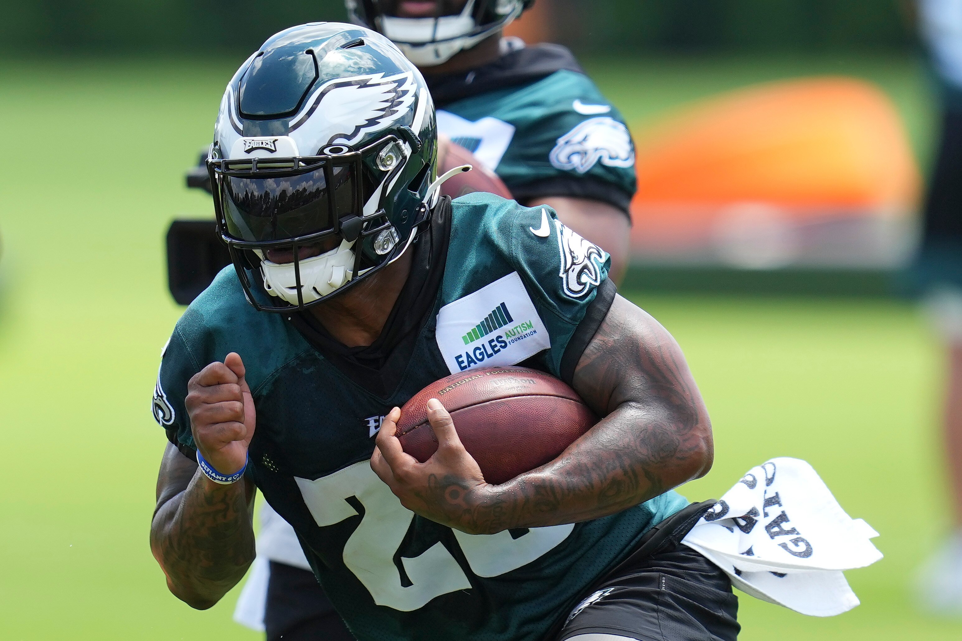 PHILADELPHIA, PA - JUNE 08: Miles Sanders #26 of the Philadelphia Eagles runs with the ball during OTAs at the NovaCare Complex on June 8, 2022 in Philadelphia, Pennsylvania. (Photo by Mitchell Leff/Getty Images)