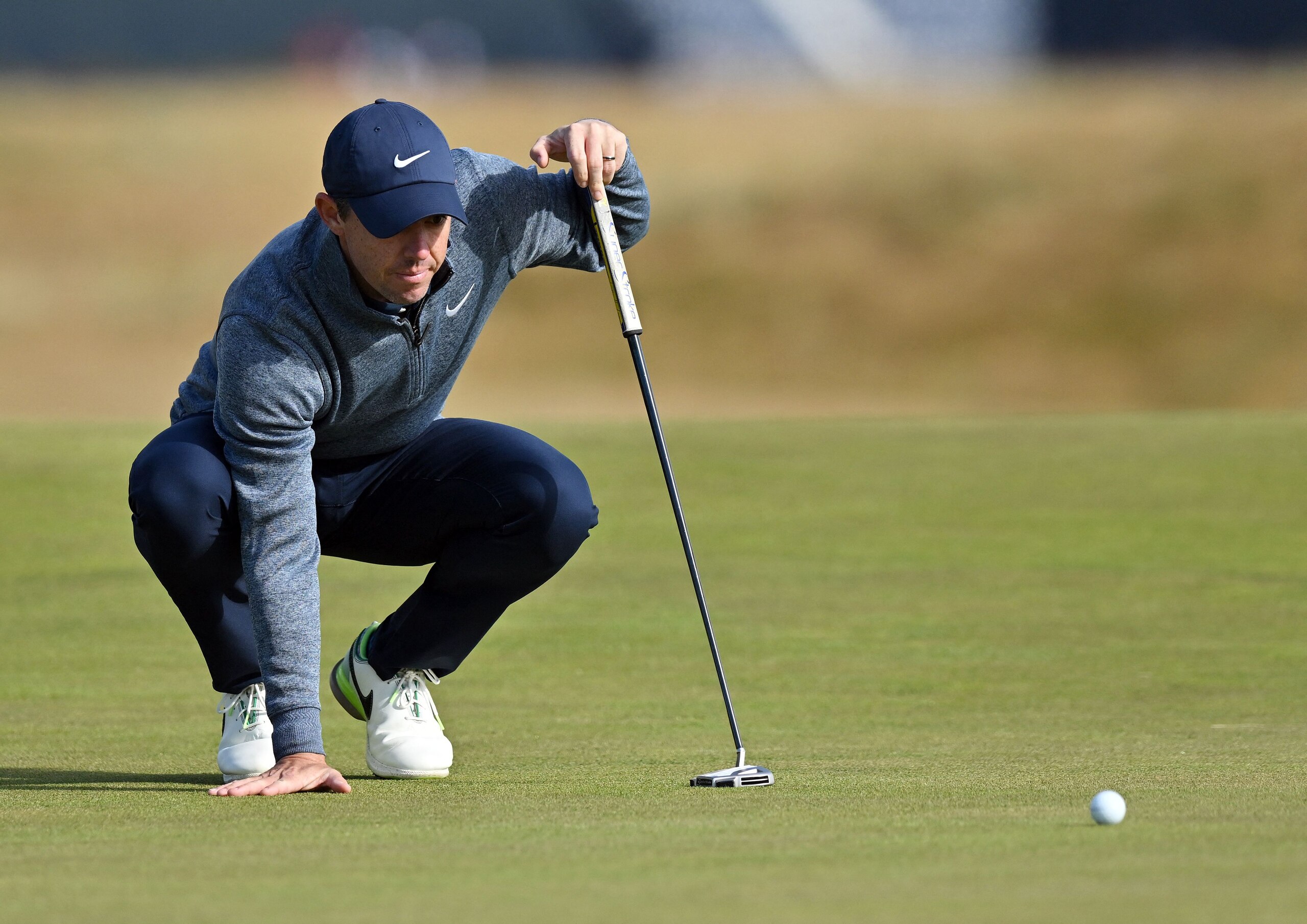 Northern Ireland's Rory McIlroy lines up a putt on the 17th green during a practice round for The 150th British Open Golf Championship on The Old Course at St Andrews in Scotland on July 13, 2022. - RESTRICTED TO EDITORIAL USE (Photo by Glyn KIRK / AFP) / RESTRICTED TO EDITORIAL USE (Photo by GLYN KIRK/AFP via Getty Images) Northern Ireland's Rory McIlroy lines up a putt on the 17th green during a practice round for The 150th British Open Golf Championship on The Old Course at St Andrews in Scotland on July 13, 2022. - RESTRICTED TO EDITORIAL USE (Photo by Glyn KIRK / AFP) / RESTRICTED TO EDITORIAL USE (Photo by GLYN KIRK/AFP via Getty Images)