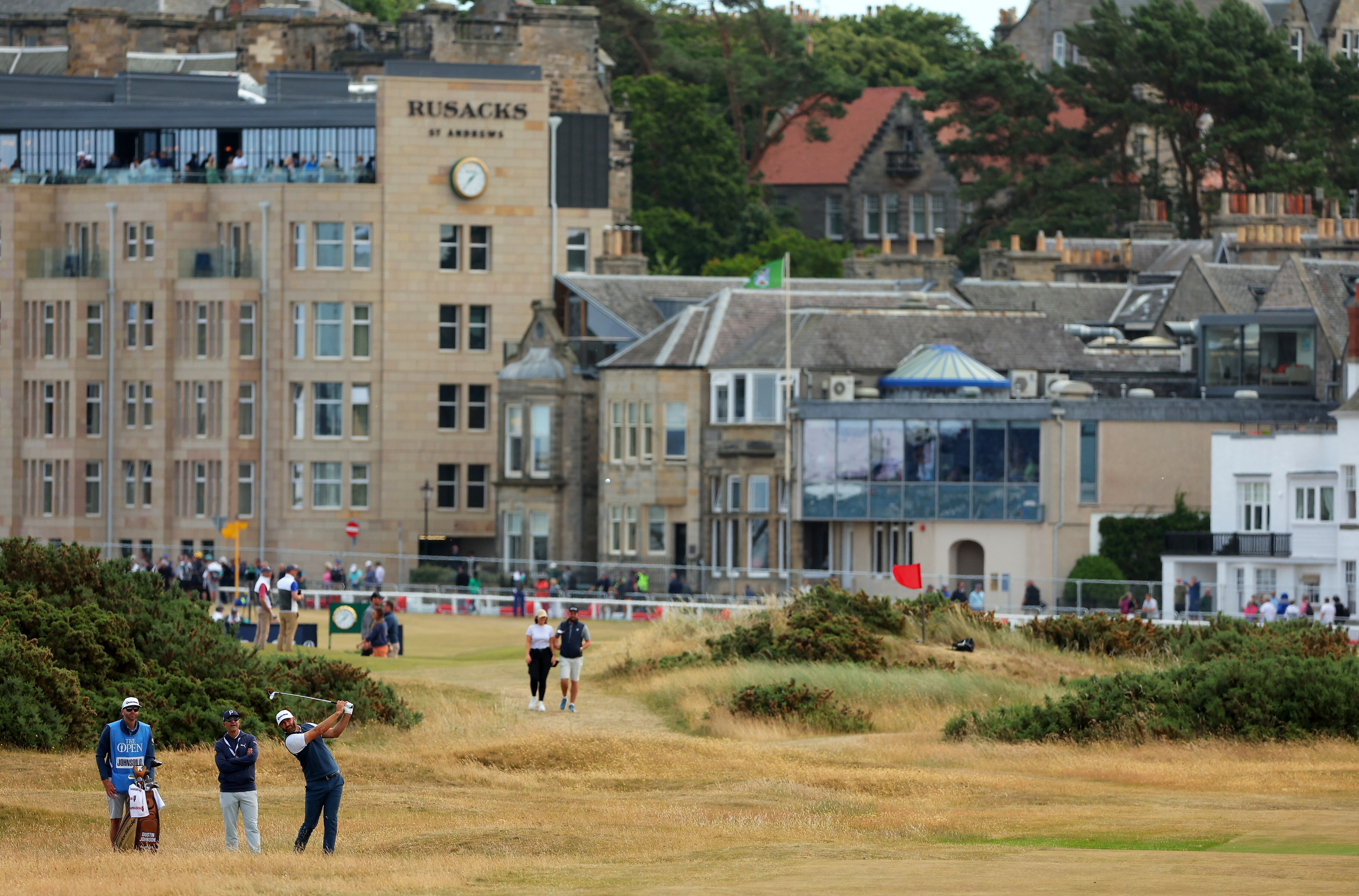 ST ANDREWS, SCOTLAND - JULY 13: Dustin Johnson of The United States plays a shot during a practice round prior to The 150th Open at St Andrews Old Course on July 13, 2022 in St Andrews, Scotland. (Photo by Kevin C. Cox/Getty Images)