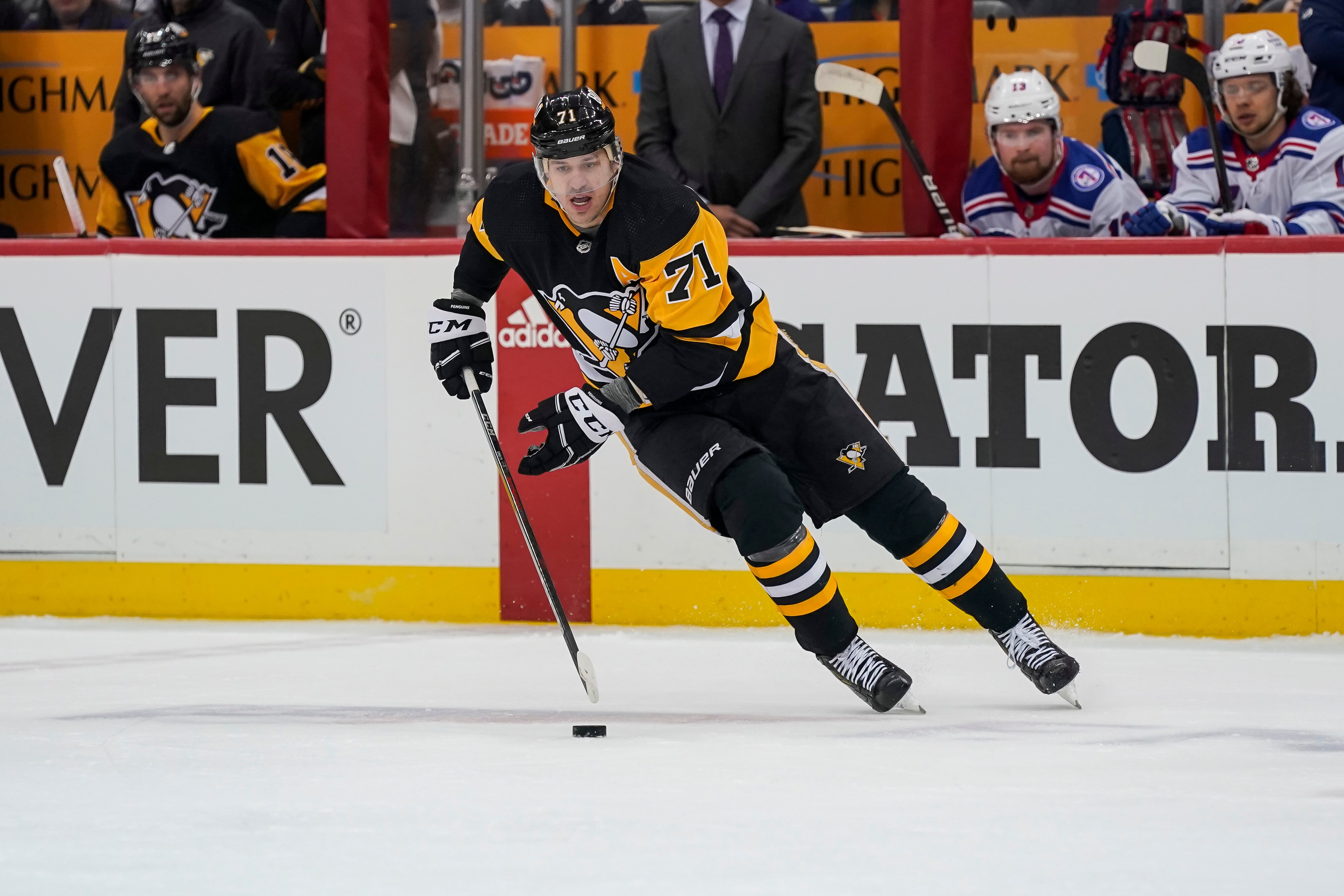 PITTSBURGH, PA - MAY 07: Pittsburgh Penguins center Evgeni Malkin (71) skates with the puck during the first period in Game Three of the First Round in the 2022 NHL Stanley Cup Playoffs between the New York Rangers and the Pittsburgh Penguins on May 7, 2022, at PPG Paints Arena in Pittsburgh, PA. (Photo by Jeanine Leech/Icon Sportswire via Getty Images)