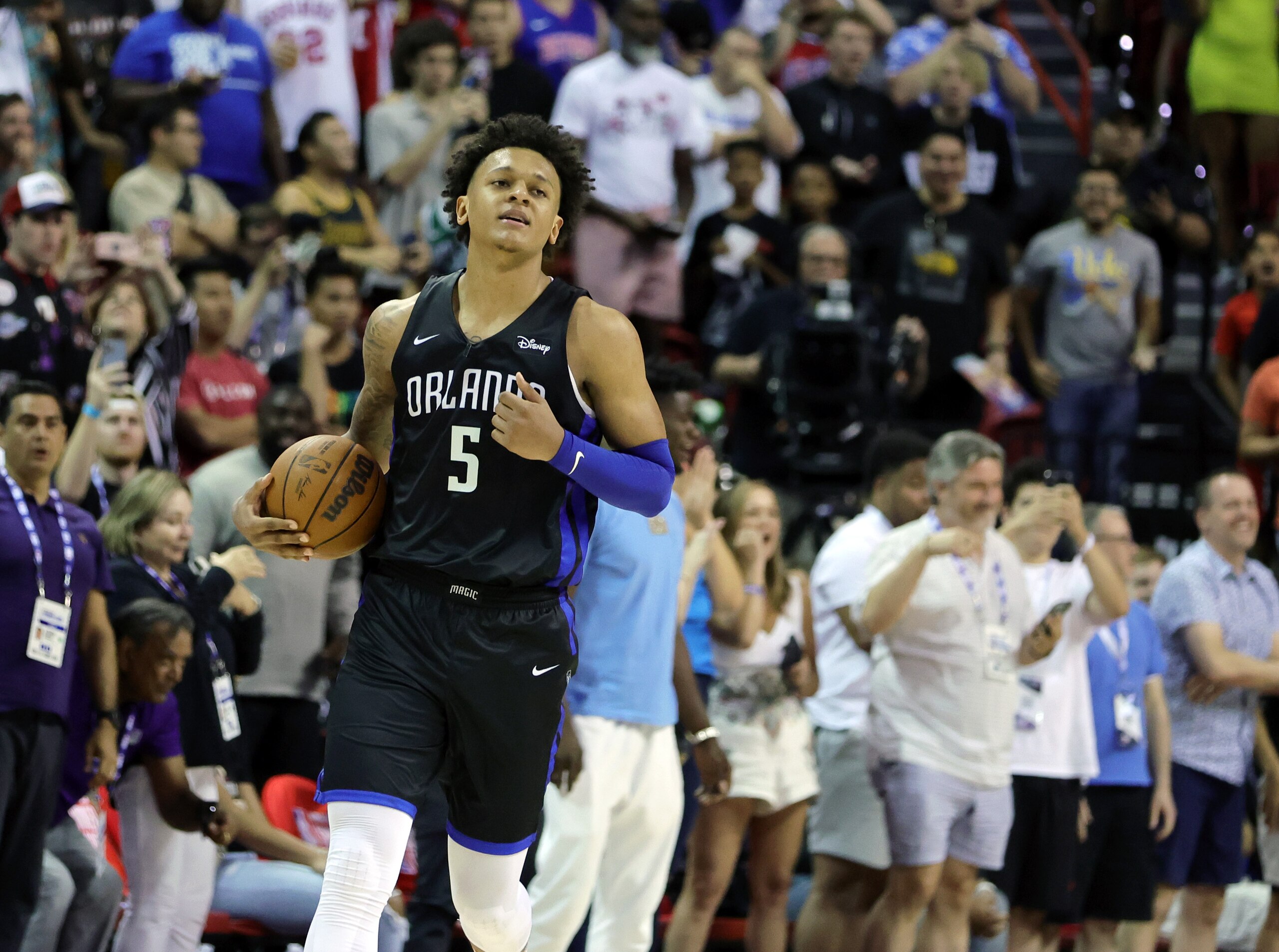 LAS VEGAS, NEVADA - JULY 09: Paolo Banchero #5 of the Orlando Magic reacts after being called for a foul after blocking an alley-oop dunk attempt by Neemias Queta #88 of the Sacramento Kings that would have won the game in sudden-death overtime for the Kings during the 2022 NBA Summer League at the Thomas & Mack Center on July 09, 2022 in Las Vegas, Nevada. The Magic successfully challenged the foul call. NOTE TO USER: User expressly acknowledges and agrees that, by downloading and or using this photograph, User is consenting to the terms and conditions of the Getty Images License Agreement. (Photo by Ethan Miller/Getty Images)
