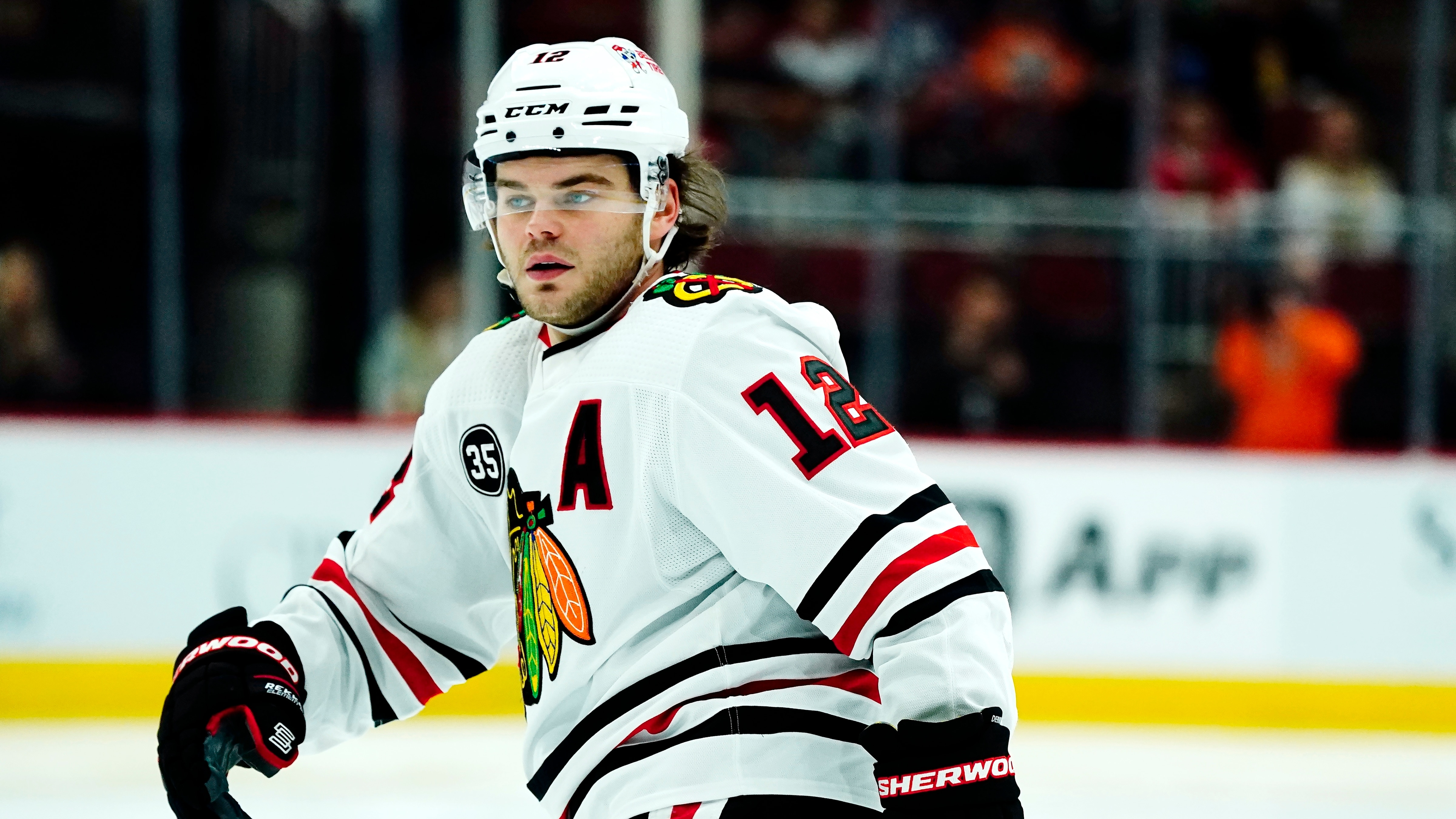 Chicago Blackhawks left wing Alex DeBrincat watches the movement of the puck during the second period of an NHL hockey game against the Arizona Coyotes Wednesday, April 20, 2022, in Glendale, Ariz. The Blackhawks won 4-3 in overtime. (AP Photo/Ross D. Franklin)