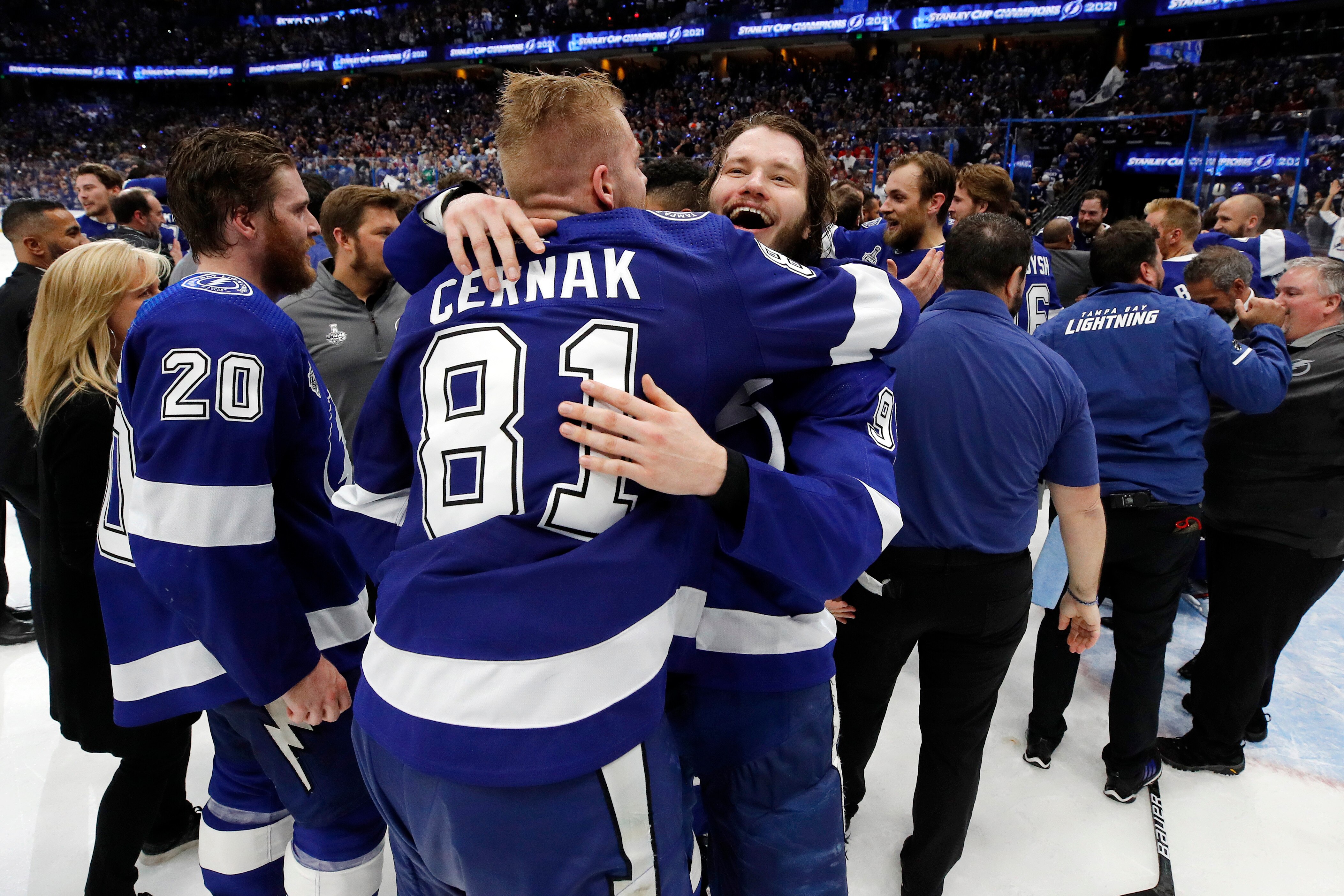 TAMPA, FLORIDA - JULY 07:  Mikhail Sergachev #98 and Erik Cernak #81 of the Tampa Bay Lightning celebrate after their 1-0 victory against the Montreal Canadiens in Game Five to win the 2021 NHL Stanley Cup Final at Amalie Arena on July 07, 2021 in Tampa, Florida. (Photo by Bruce Bennett/Getty Images)