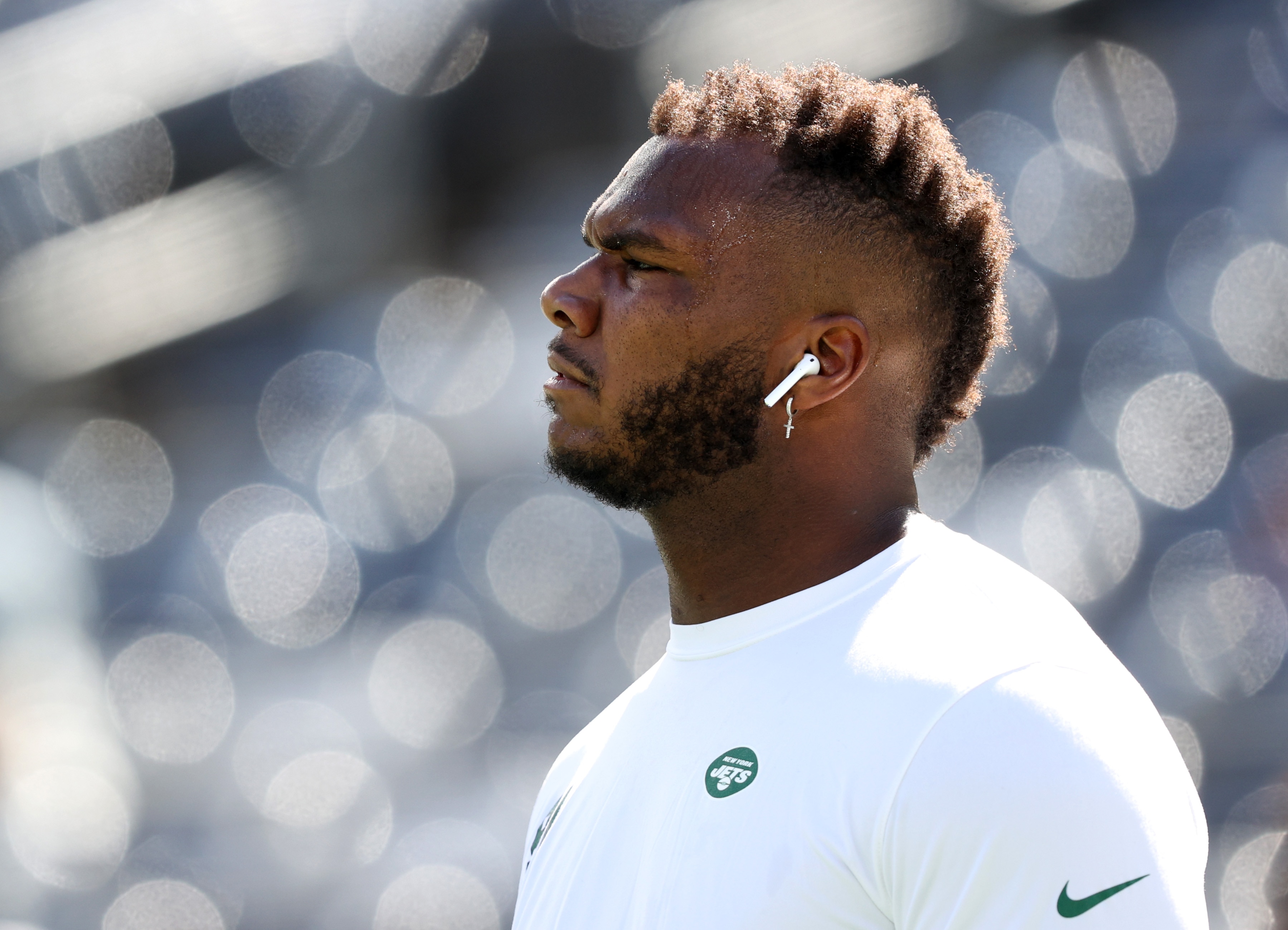 EAST RUTHERFORD, NEW JERSEY - SEPTEMBER 19: Defensive end John Franklin-Myers #91 of the New York Jets warms up before the game against the New England Patriots at MetLife Stadium on September 19, 2021 in East Rutherford, New Jersey. (Photo by Elsa/Getty Images)