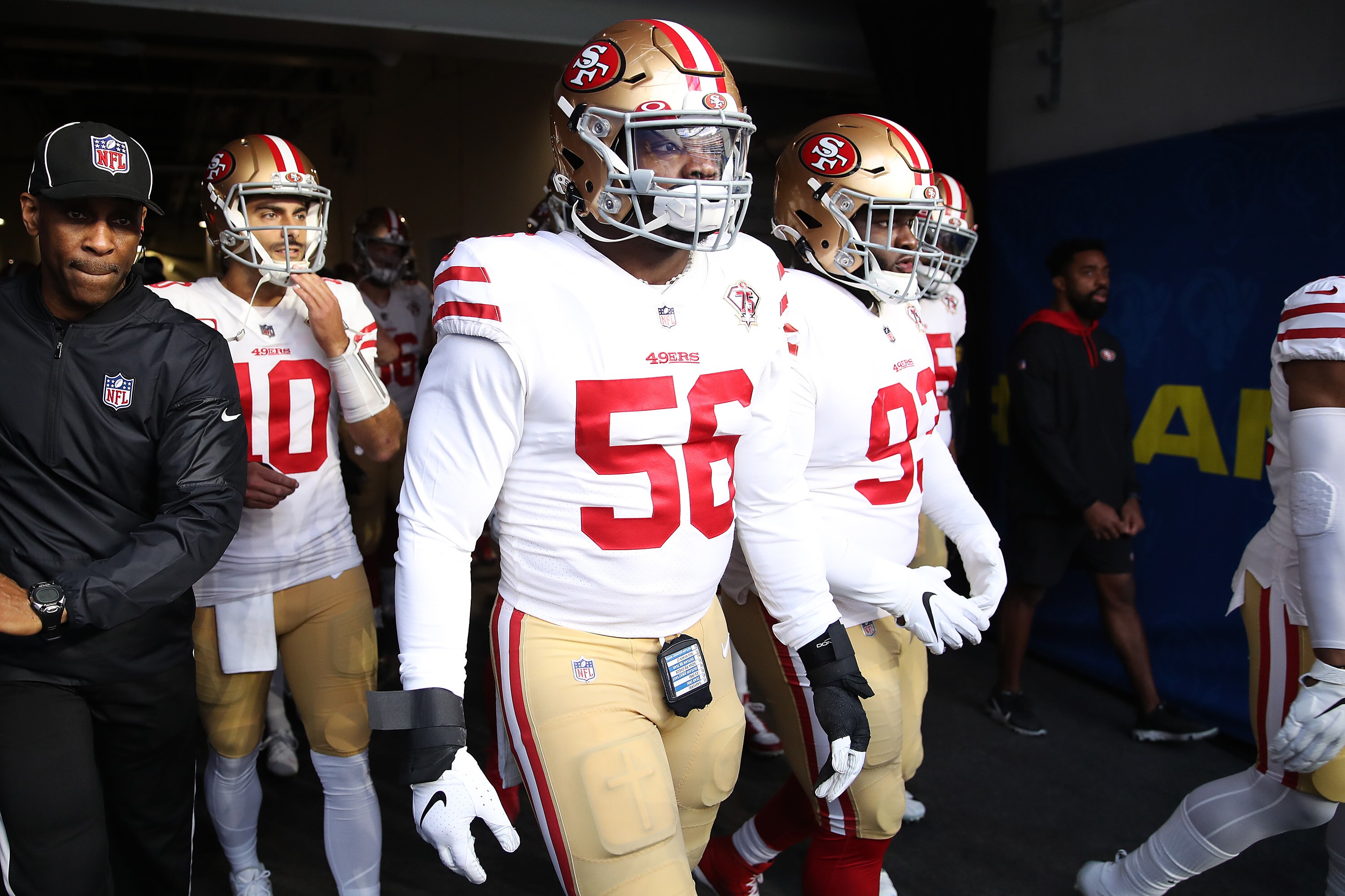 INGLEWOOD, CALIFORNIA - JANUARY 30: Samson Ebukam #56 of the San Francisco 49ers prepares to take the field with teammates before the NFC Championship Game against the Los Angeles Rams at SoFi Stadium on January 30, 2022 in Inglewood, California. (Photo by Christian Petersen/Getty Images)
