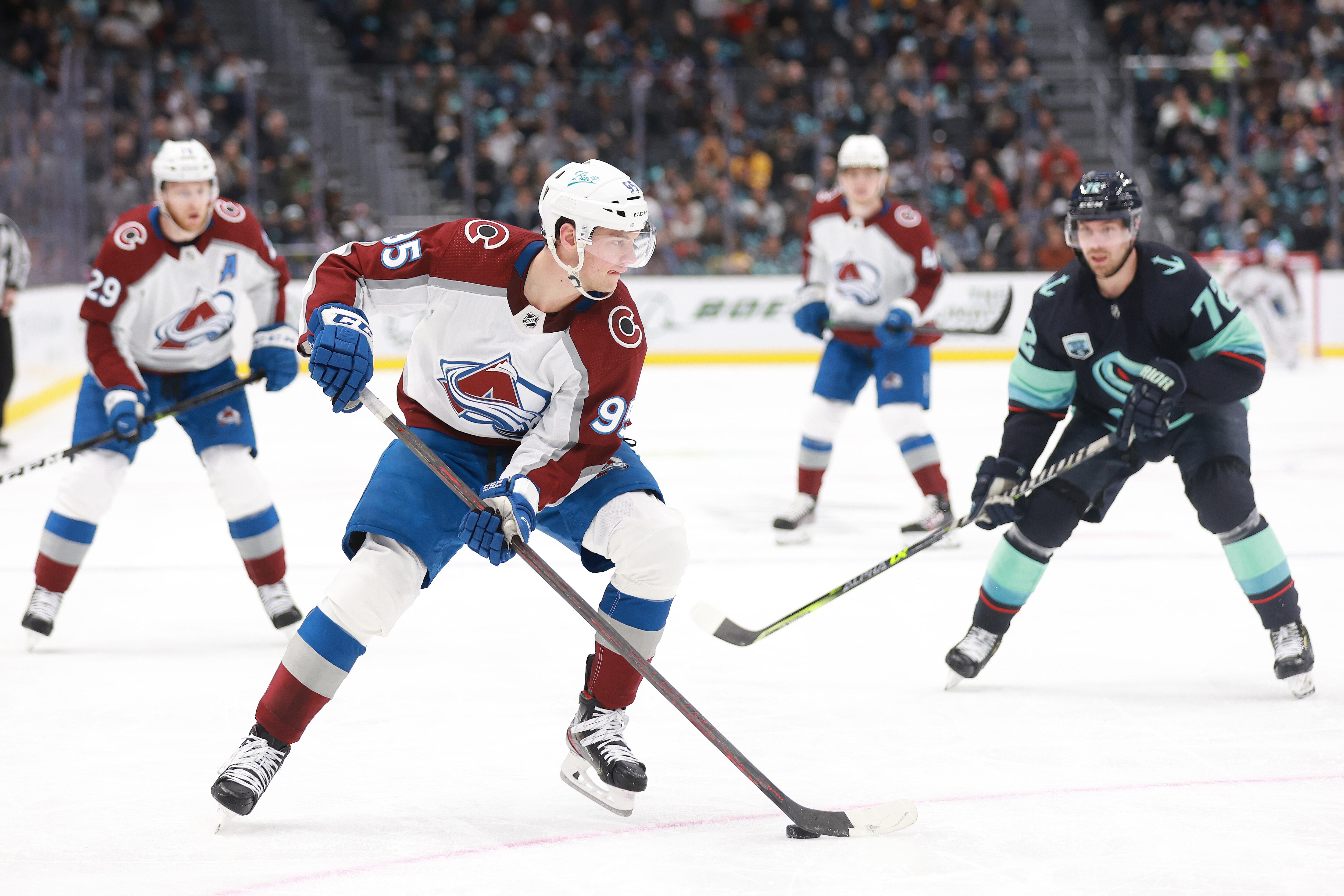 SEATTLE, WASHINGTON - APRIL 20: Andre Burakovsky #95 of the Colorado Avalanche skates with the puck against the Colorado Avalanche during the second period at Climate Pledge Arena on April 20, 2022 in Seattle, Washington. (Photo by Abbie Parr/NHLI via Getty Images)