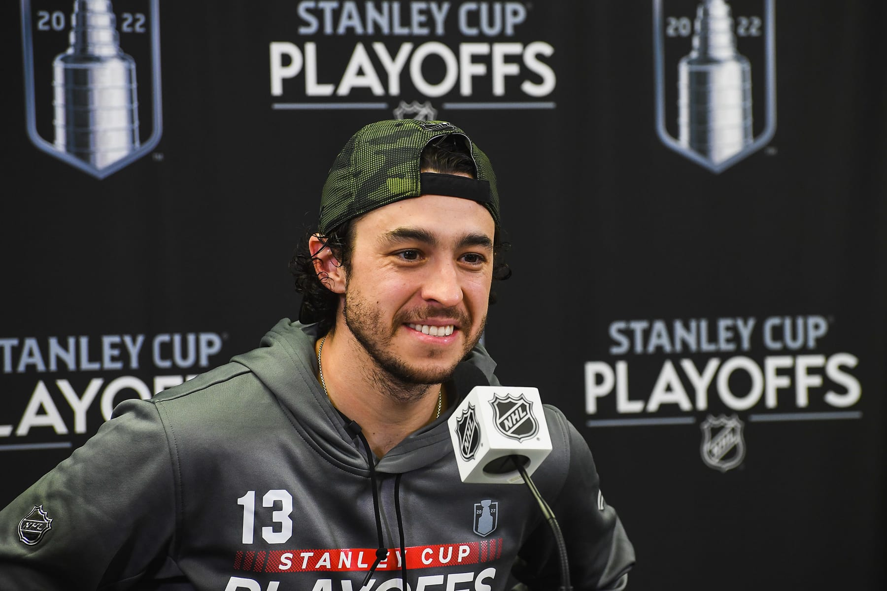 CALGARY, AB - MAY 15: Johnny Gaudreau #13 of the Calgary Flames speaks to media after the Flames defeated the Dallas Stars during the overtime period of Game Seven of the First Round of the 2022 Stanley Cup Playoffs at Scotiabank Saddledome on May 15, 2022 in Calgary, Alberta, Canada. The Flames defeated the Stars 3-2 in overtime. (Photo by Derek Leung/Getty Images)