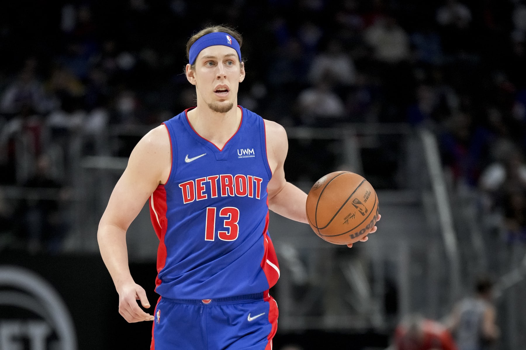 DETROIT, MICHIGAN - APRIL 08: Kelly Olynyk #13 of the Detroit Pistons handles the ball against the Milwaukee Bucks during the second quarter at Little Caesars Arena on April 08, 2022 in Detroit, Michigan. NOTE TO USER: User expressly acknowledges and agrees that, by downloading and or using this photograph, User is consenting to the terms and conditions of the Getty Images License Agreement. (Photo by Nic Antaya/Getty Images) DETROIT, MICHIGAN - APRIL 08: Kelly Olynyk #13 of the Detroit Pistons handles the ball against the Milwaukee Bucks during the second quarter at Little Caesars Arena on April 08, 2022 in Detroit, Michigan. NOTE TO USER: User expressly acknowledges and agrees that, by downloading and or using this photograph, User is consenting to the terms and conditions of the Getty Images License Agreement. (Photo by Nic Antaya/Getty Images)