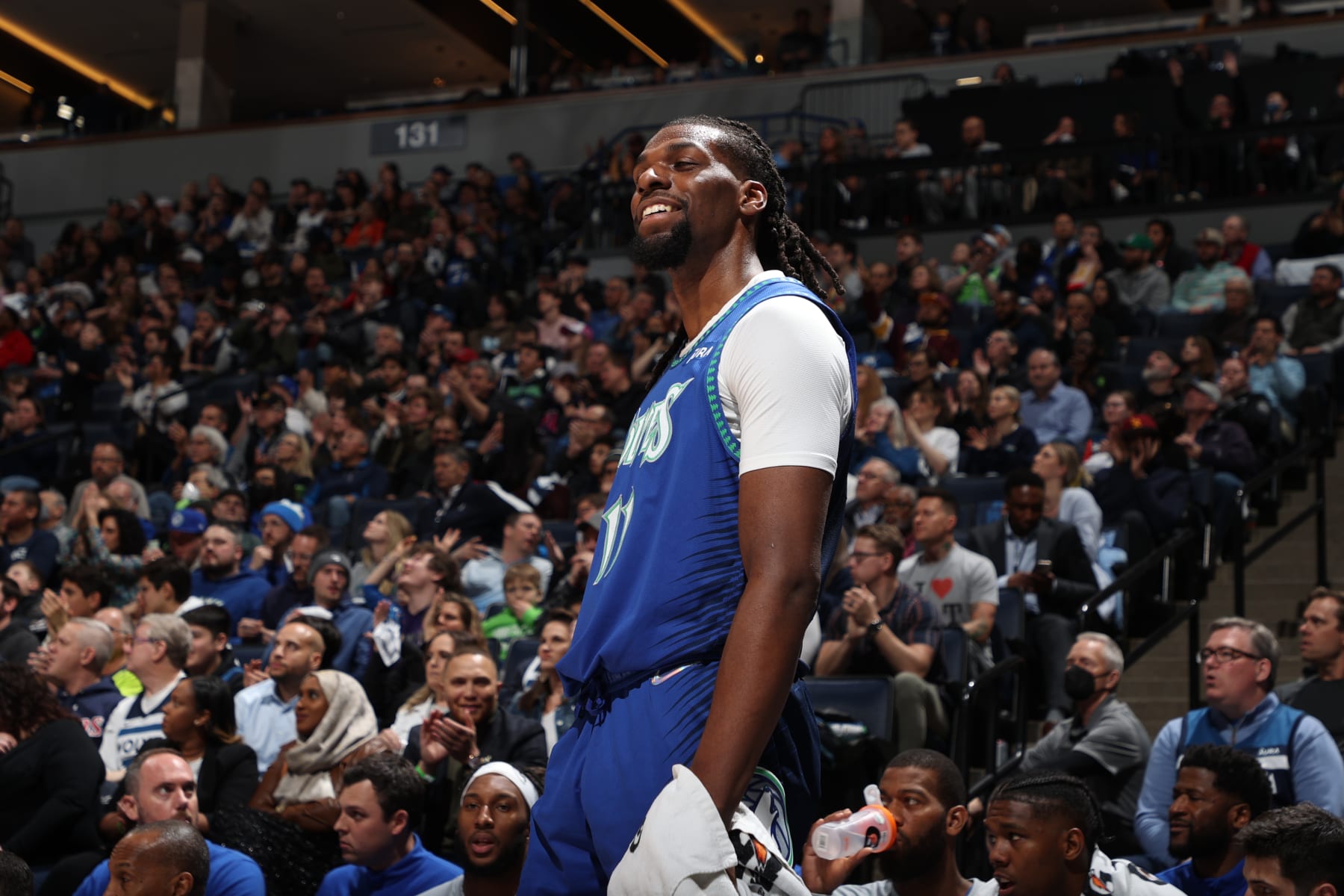 MINNEAPOLIS, MN - APRIL 7: Naz Reid #11 of the Minnesota Timberwolves celebrates during the game against the San Antonio Spurs on April 7, 2022 at Target Center in Minneapolis, Minnesota. NOTE TO USER: User expressly acknowledges and agrees that, by downloading and or using this Photograph, user is consenting to the terms and conditions of the Getty Images License Agreement. Mandatory Copyright Notice: Copyright 2022 NBAE (Photo by David Sherman/NBAE via Getty Images)