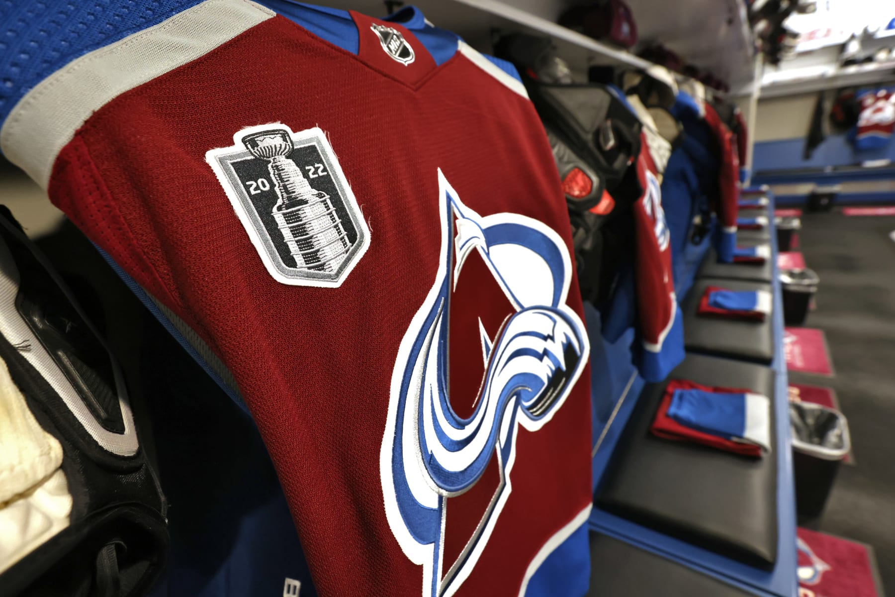 DENVER, COLORADO - JUNE 18: A detailed view of the Stanley Cup logo on a Colorado Avalanche jersey in the locker room before Game Two of the 2022 Stanley Cup Final between the Tampa Bay Lightning and the Colorado Avalanche at Ball Arena on June 18, 2022 in Denver, Colorado. (Photo by Dave Sandford/NHLI via Getty Images)