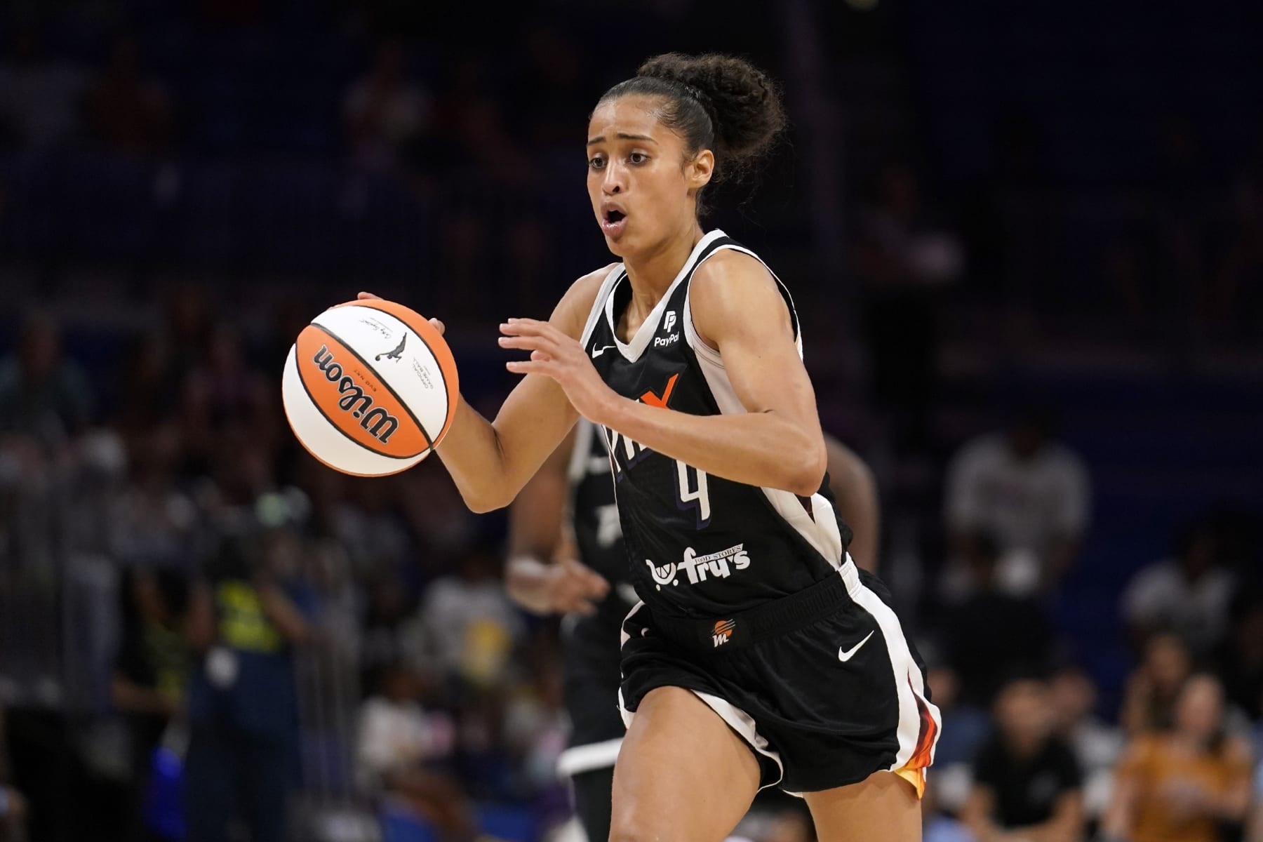 Phoenix Mercury's Skylar Diggins-Smith handles the ball during a WNBA basketball game against the Dallas Wings, Saturday, June 18, 2022, in Arlington, Texas. (AP Photo/Tony Gutierrez)
