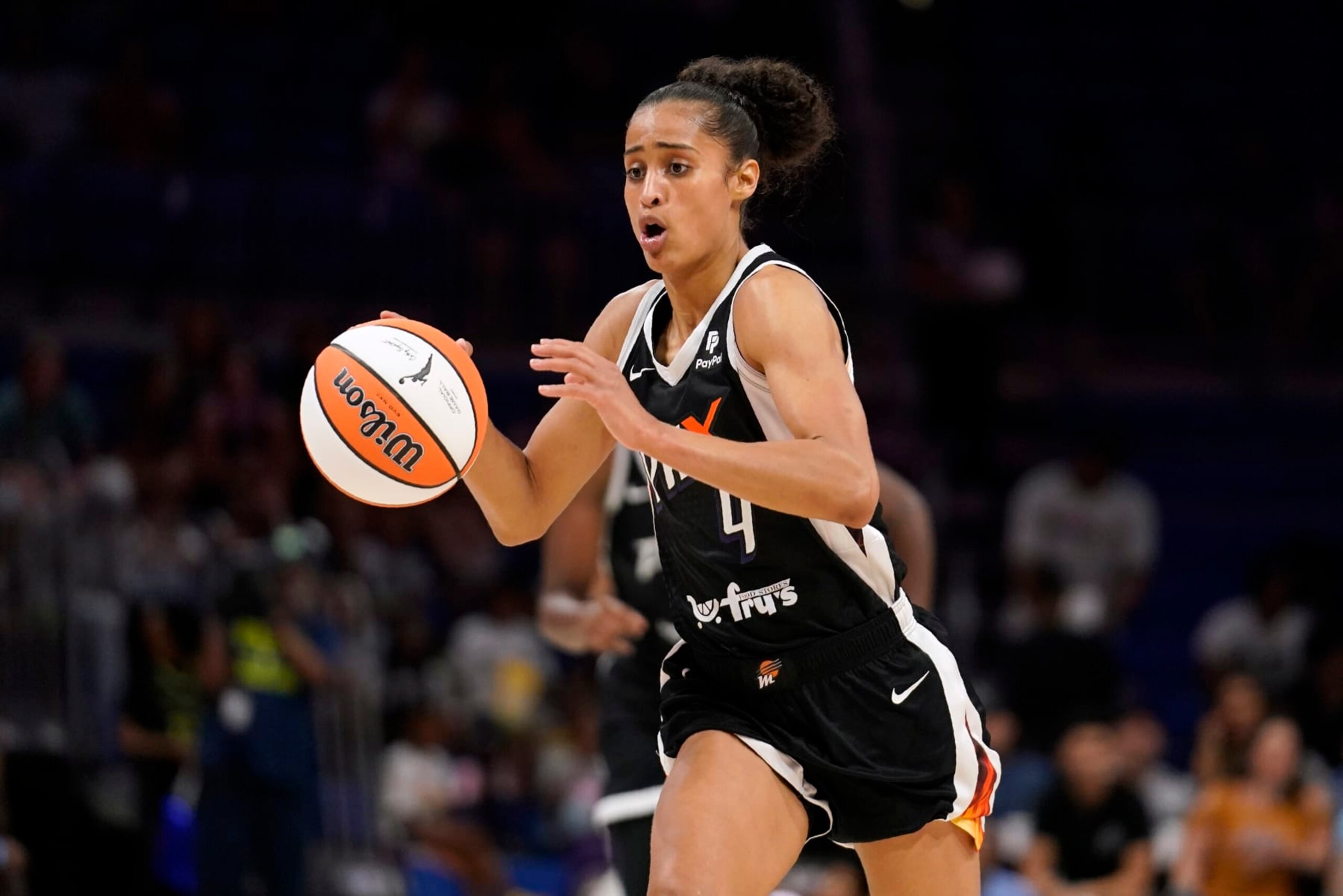 Phoenix Mercury's Skylar Diggins-Smith handles the ball during a WNBA basketball game against the Dallas Wings, Saturday, June 18, 2022, in Arlington, Texas. (AP Photo/Tony Gutierrez)