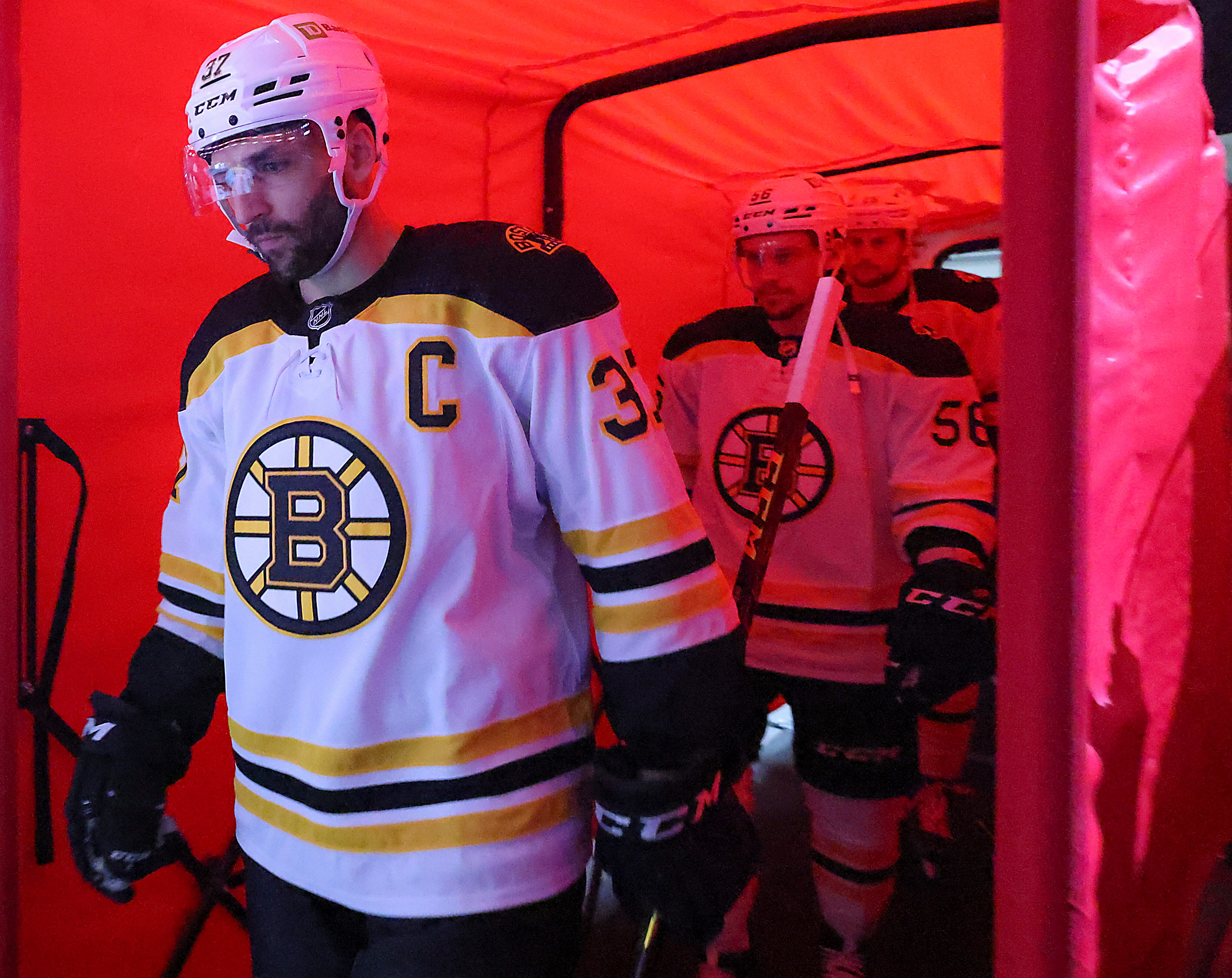 Raleigh - May 14: Boston Bruins Patrice Bergeron leading his team onto the ice to play the Carolina Hurricane. The Boston Bruins visit the Carolina Hurricanes for Game 7 in the NHL playoff game at PNC Arena in Raleigh, NC on May 14, 2022. (Photo by Matthew J. Lee/The Boston Globe via Getty Images)