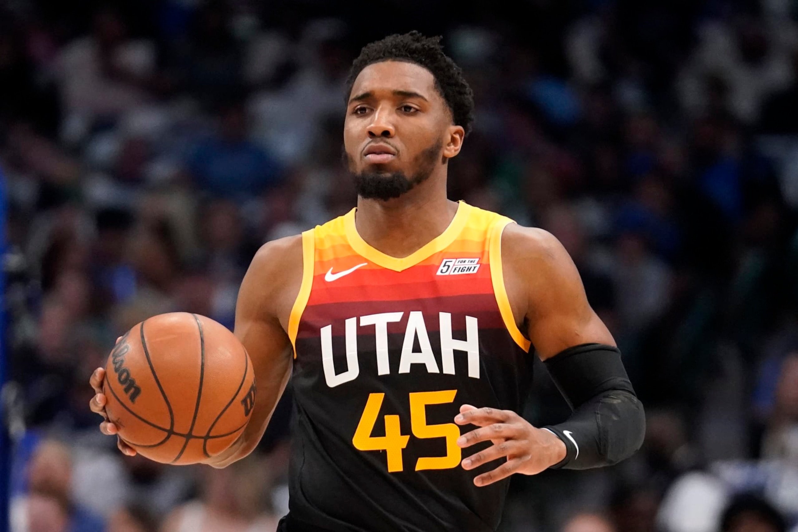 Utah Jazz guard Donovan Mitchell works up court during Game 2 of an NBA basketball first-round playoff series against the Dallas Mavericks, Monday, April 18, 2022, in Dallas. (AP Photo/Tony Gutierrez)