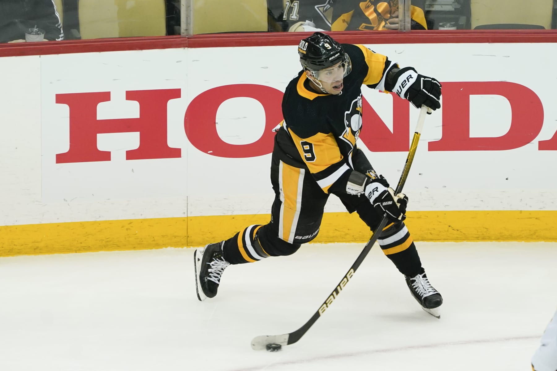 Pittsburgh Penguins' Evan Rodrigues (9) plays against the Nashville Predators during the third period of an NHL hockey game, Sunday, April 10, 2022, in Pittsburgh. (AP Photo/Keith Srakocic)
