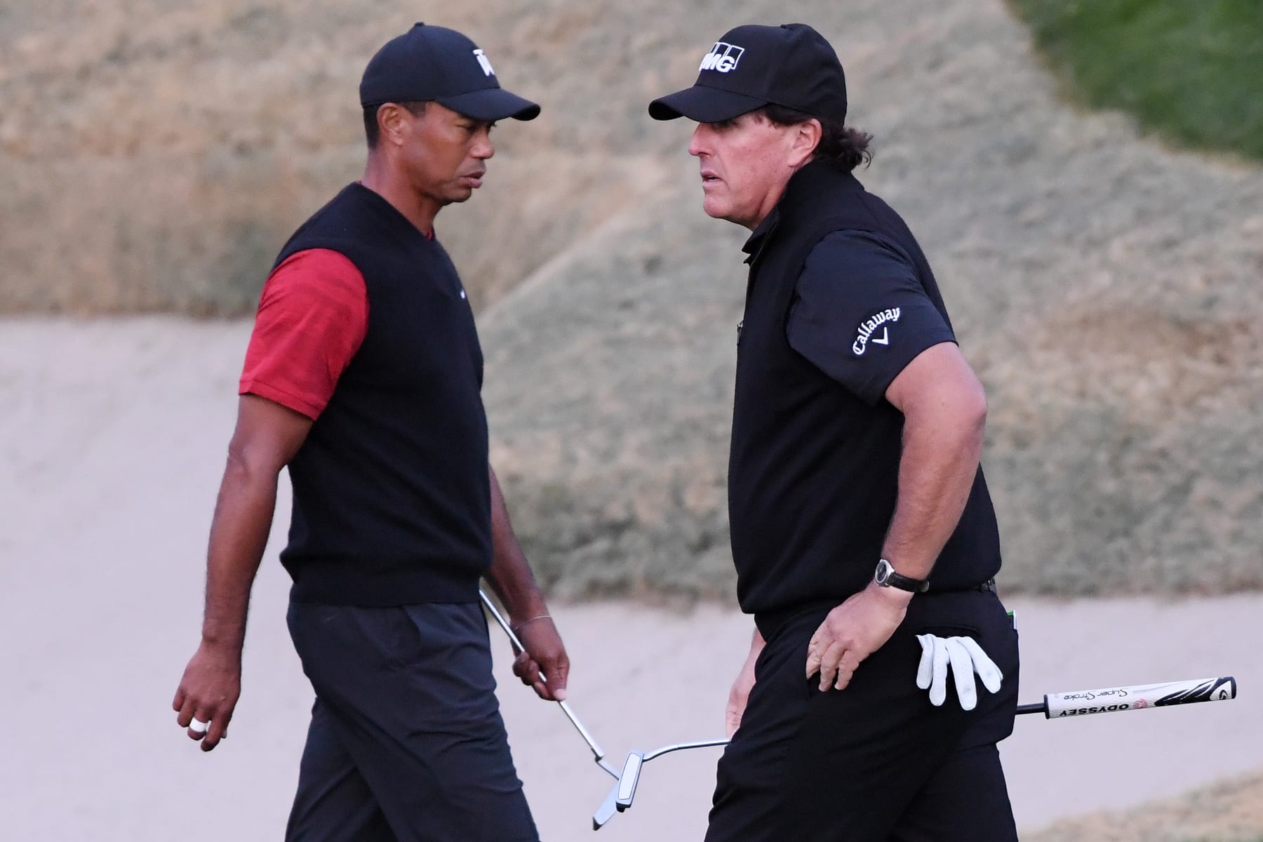 LAS VEGAS, NV - NOVEMBER 23:  Tiger Woods and Phil Mickelson walk on the 18th hole during The Match: Tiger vs Phil at Shadow Creek Golf Course on November 23, 2018 in Las Vegas, Nevada.  (Photo by Harry How/Getty Images for The Match)