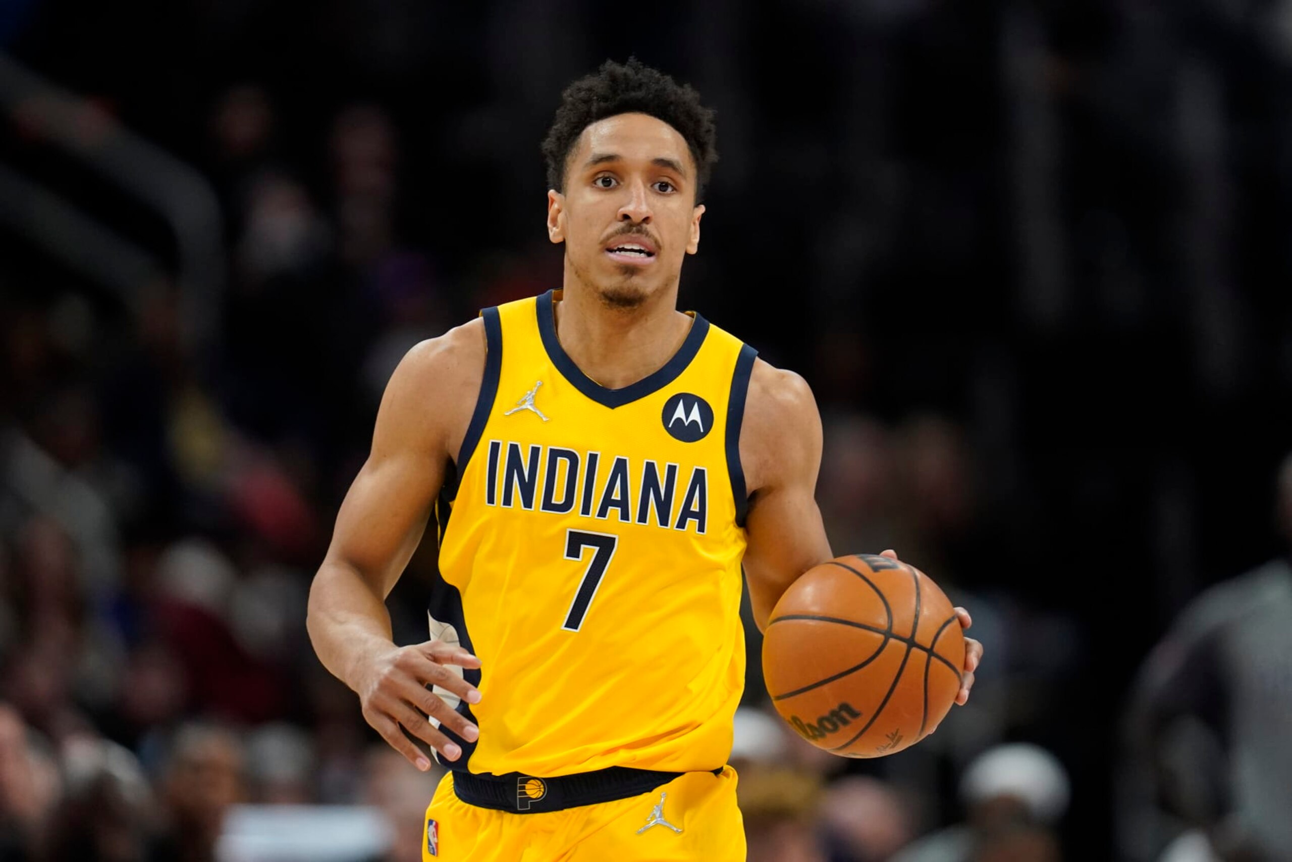 FILE - Indiana Pacers guard Malcolm Brogdon plays against the Detroit Pistons in the second half of an NBA basketball game in Detroit, on March 4, 2022. The Boston Celtics improved its backcourt depth Friday, July 1, 2022, by acquiring combo guard Malcolm Brogdon in a trade with the Indiana Pacers, a person familiar with the deal told The Associated Press. (AP Photo/Paul Sancya, File)