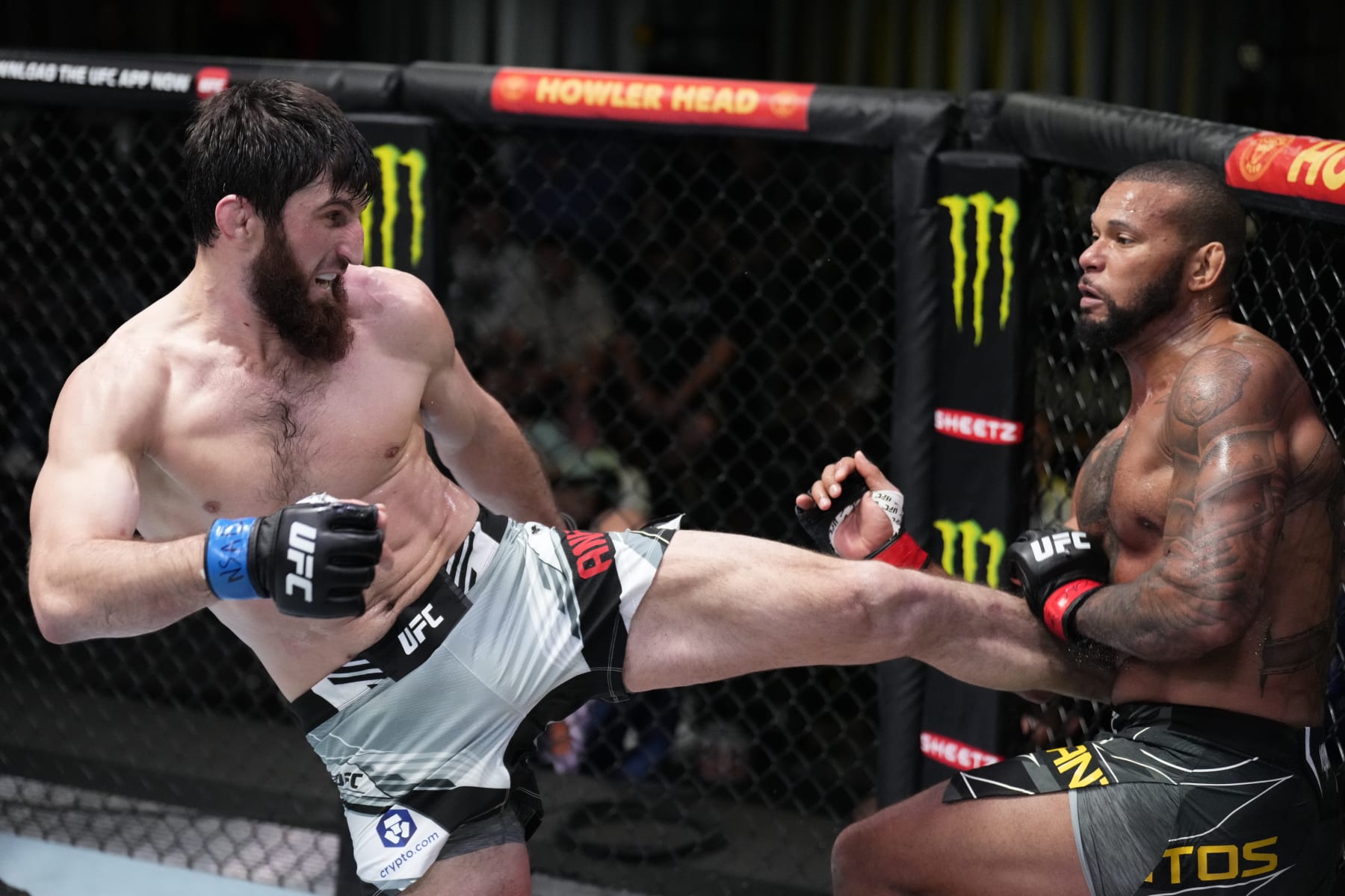 LAS VEGAS, NEVADA - MARCH 12: (L-R) Magomed Ankalaev of Russia kicks Thiago Santos of Brazil in their light heavyweight fight during the UFC Fight Night event at UFC APEX on March 12, 2022 in Las Vegas, Nevada. (Photo by Chris Unger/Zuffa LLC)